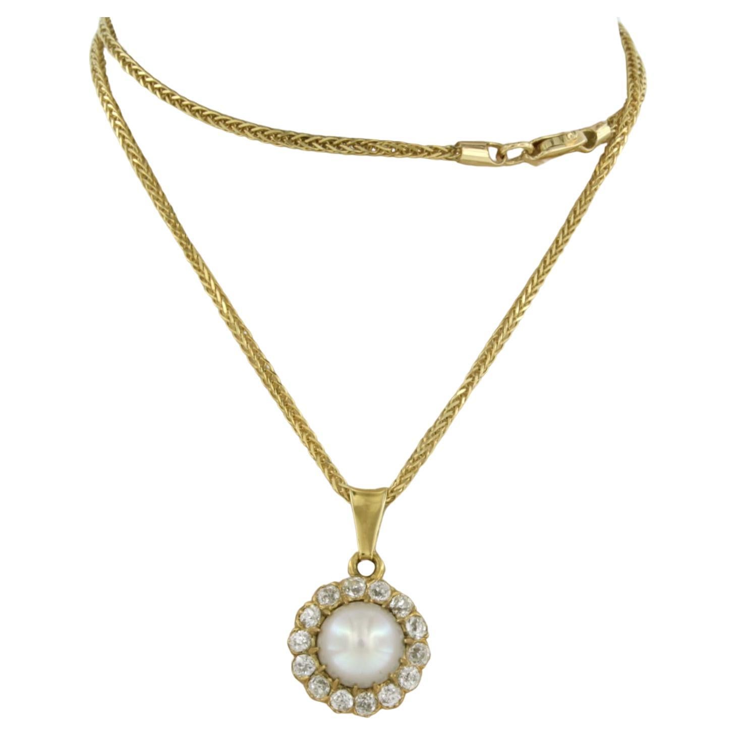 Chain and Pendant with pearl and diamonds 14k yellow gold