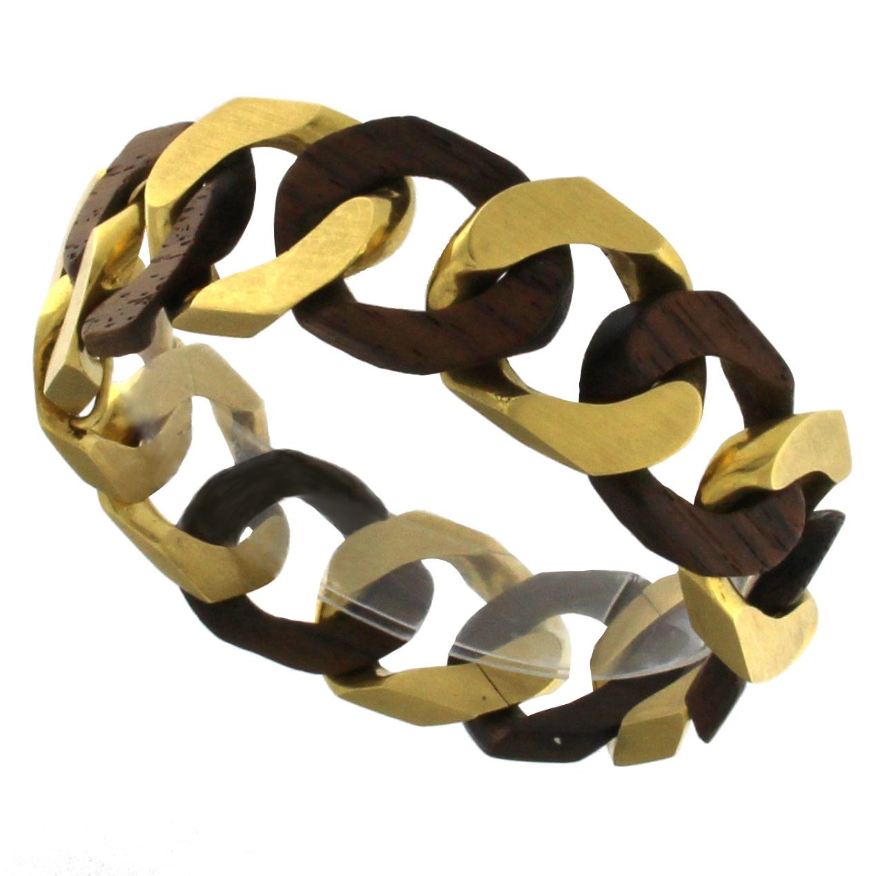 Very appealing this bracelet made in the style of the 1970s
The bracelet is made of 8 gold links and 6 rosewood links. 
The goldlink clasp is perfectly concealed.
The bracelet is 19 cm long, gold g. 58.00
Necklace to complete the set is available.