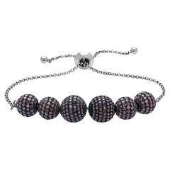 Bracelet chaîne avec boules de diamants rouges micro-pavés et perles