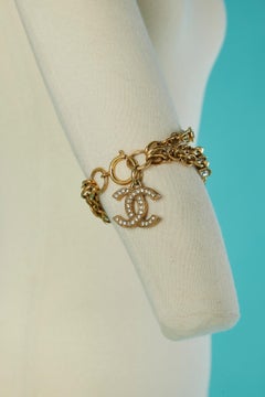 Chain bracelet with rhinestone and "CC" brand Chanel Circa 1980's 