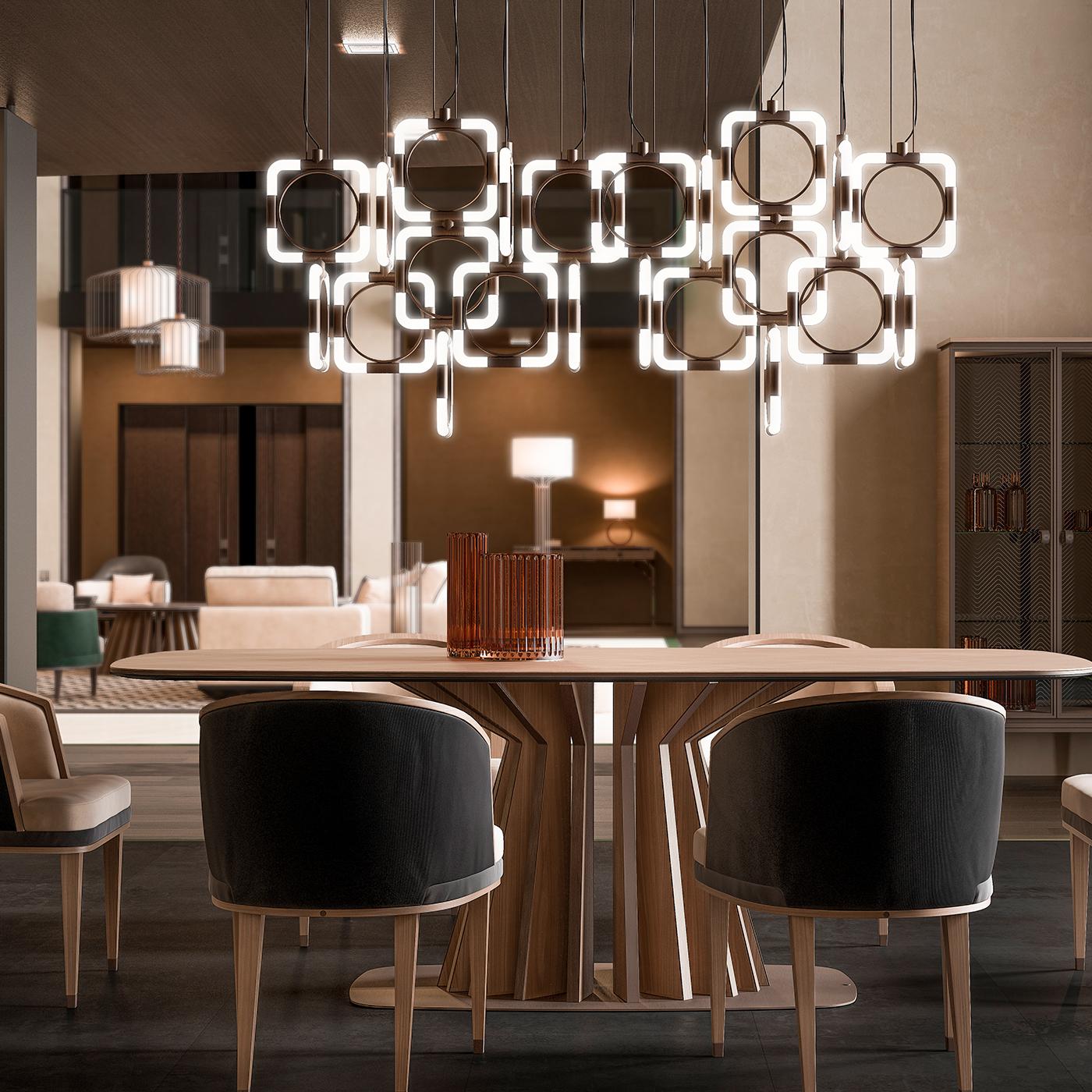 A display of geometric design, this chain chandelier will be the talking point of the room. Featuring a metal structure and tubular lighting, the chic and spirited chandelier will add an element of fun and creativity to your contemporary style