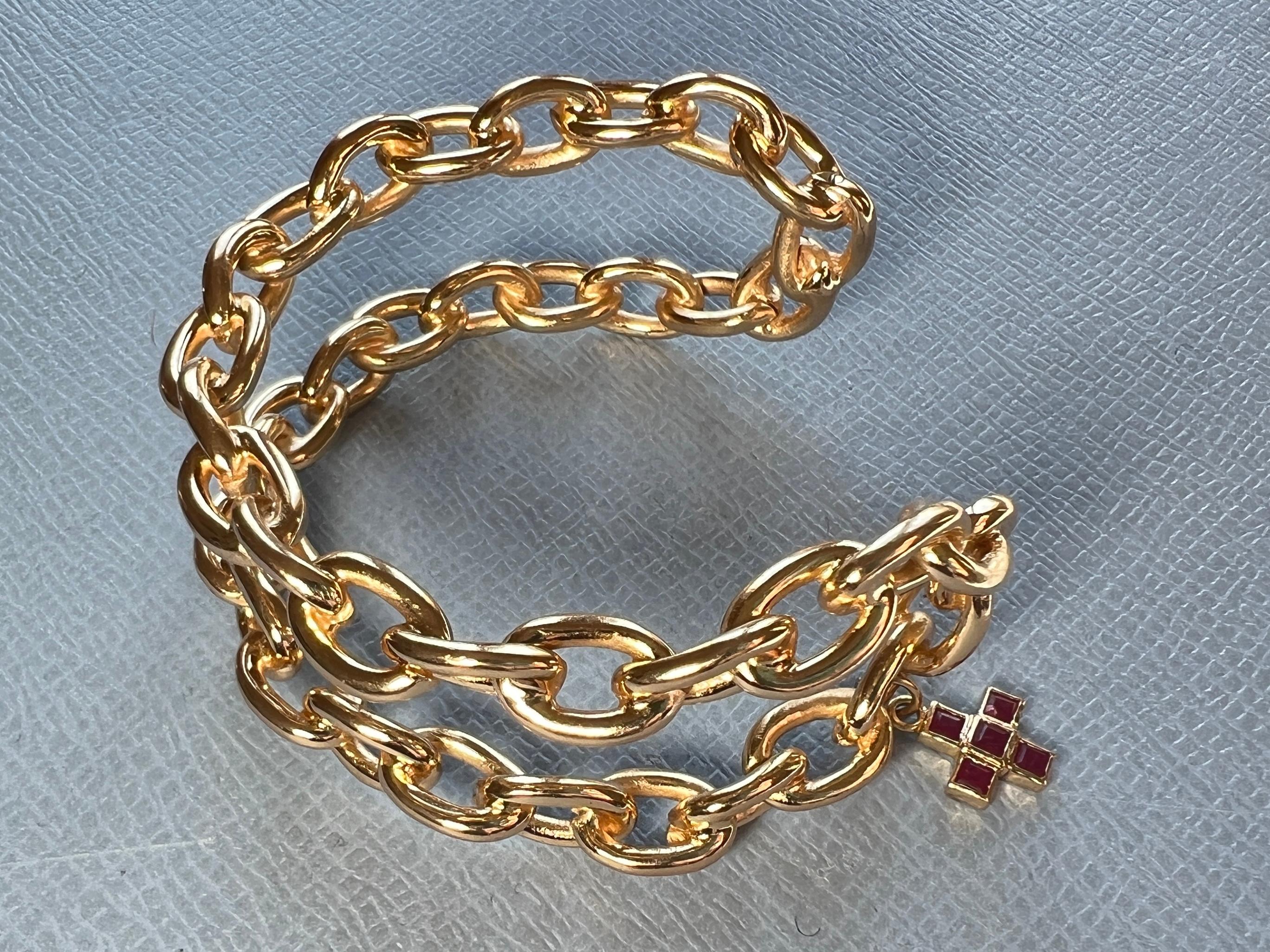 Chain Cuff Bangle Bracelet Ruby Square Cross 

Material 14 k Gold plated Brass

Designer J Dauphin

The Cuff bangle has a cross which is one of the oldest and most universal symbols found across various cultures and religious traditions. Its basic