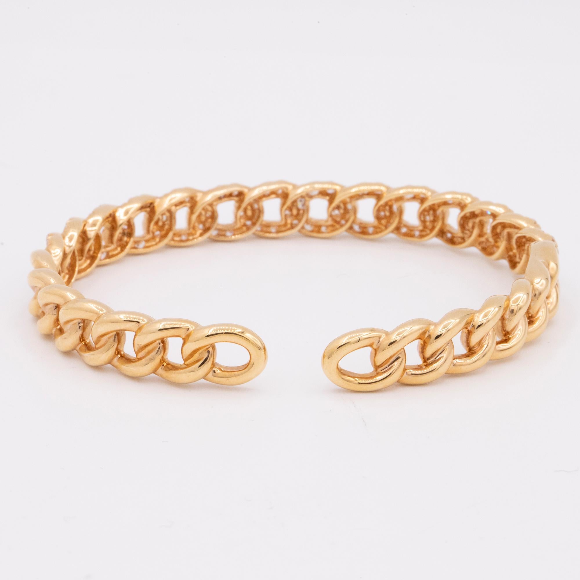 Classic chain link design bangle with 112 diamonds set half way on the bracelet, crafted in 18k rose gold. The diamond total 2.90 carats. H-I color and SI1-SI2 clarity. This bracelet has a hinged that opens to make getting it on and off easier. 8mm