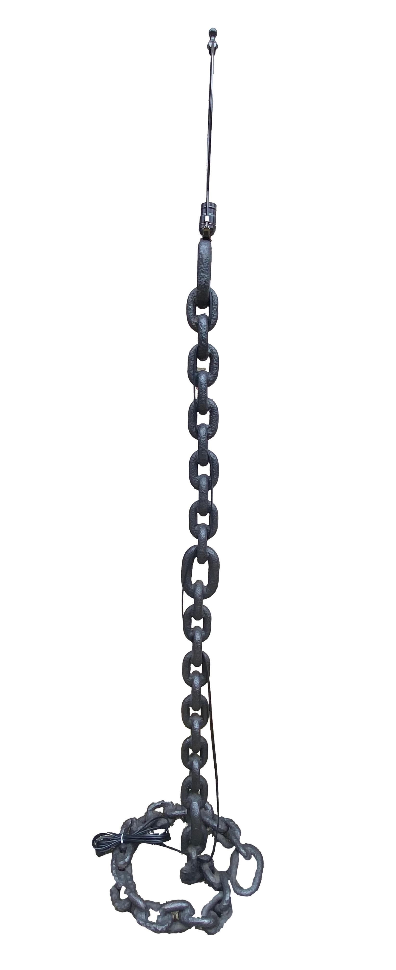 Heavy duty iron chain link floor lamp in the style of Franz West.