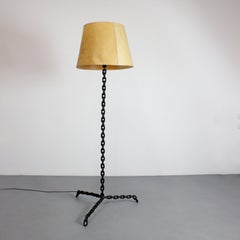 Chain Link Floor Lamp in wrought iron with a paper shade sewn with satin