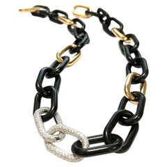 Collier à maillons en or rose, ébène, or blanc et diamants