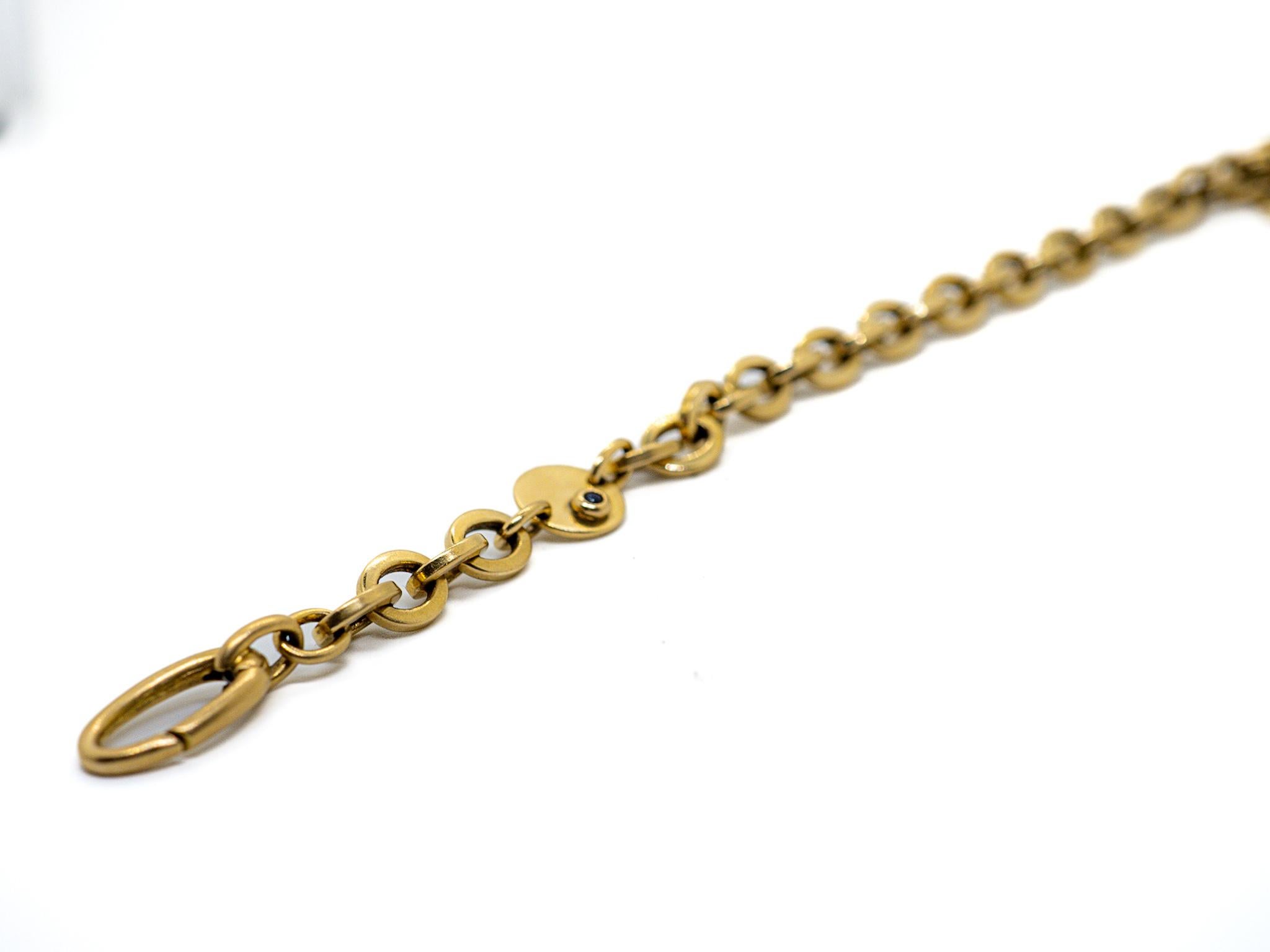 Welcome to our world of elegance and luck with our stunning Chain Lucky Charm Bracelet. Crafted with meticulous attention to detail, this exquisite bracelet is made of luxurious 18K yellow gold, radiating warmth and sophistication.

At the heart of