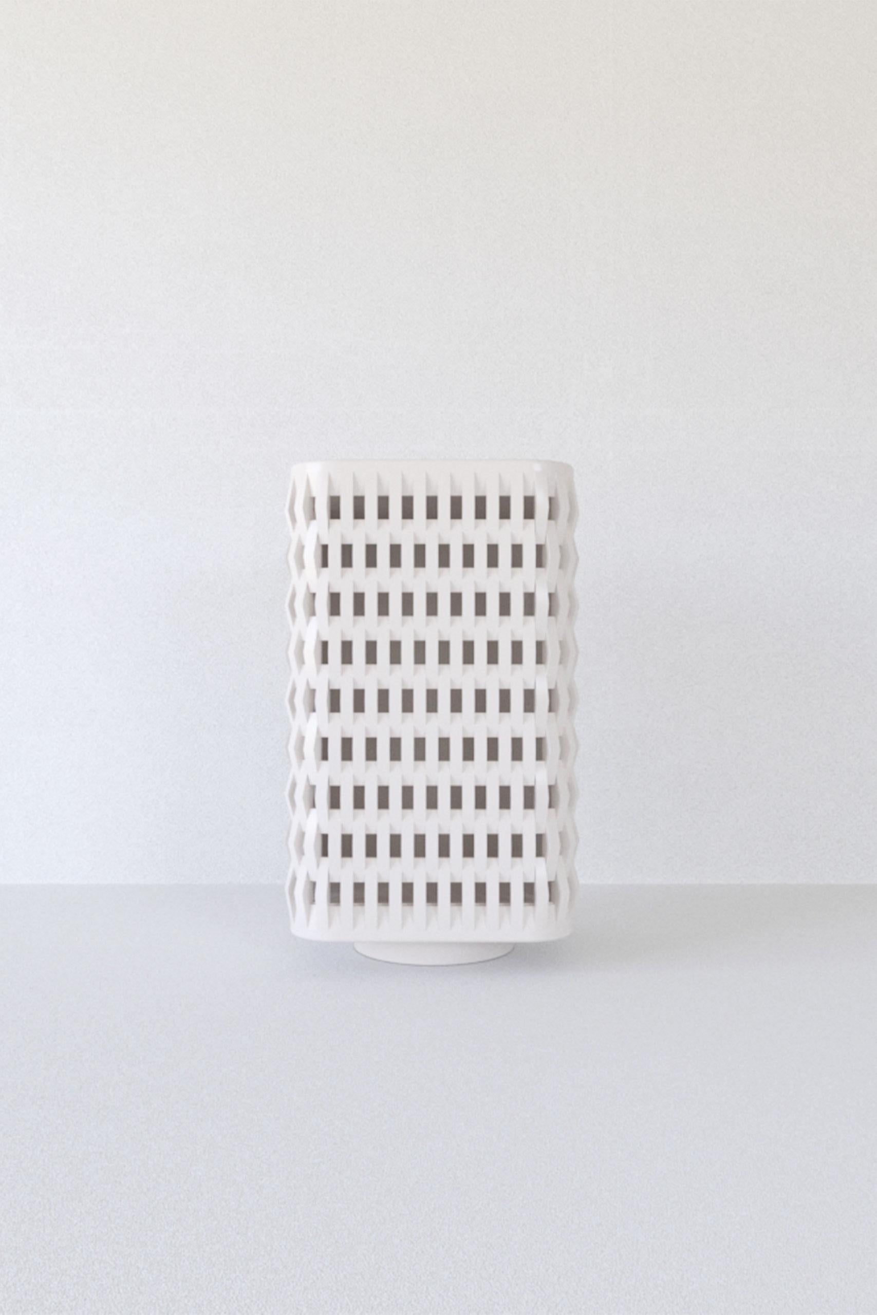 CHAIN MAIL I Cabinet by ZEMNA
Designed by Tetiana Krasutska and Andrew Dobryansky.
Dimensions: D 43 x W 47 x H 85 cm. 
Materials:  Wood and ceramic granite.

We were inspired by a chain mail when we created these facades.
Also we tried to look at an