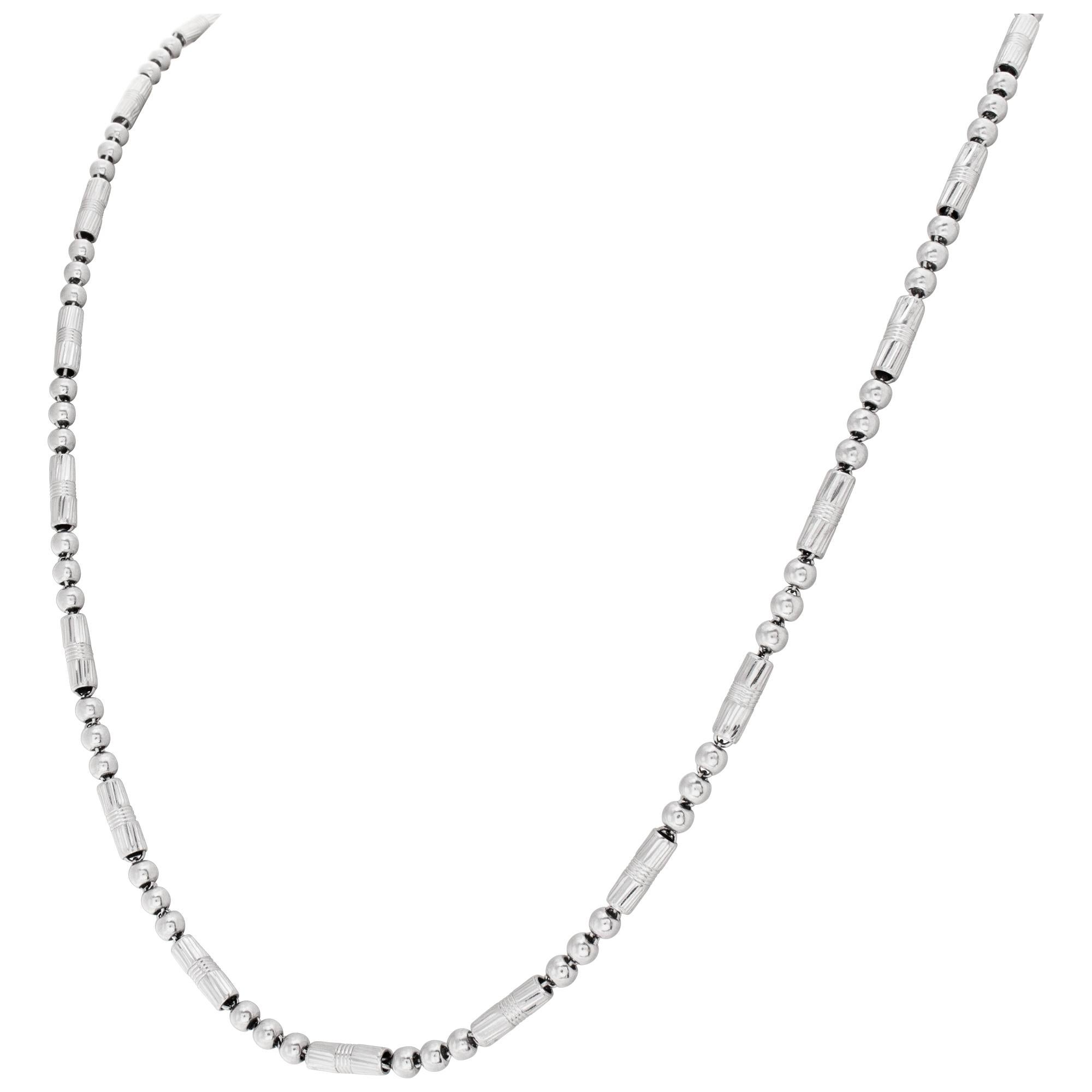Exclusive chain necklace in platinum- 24inches. Width 4mm.
