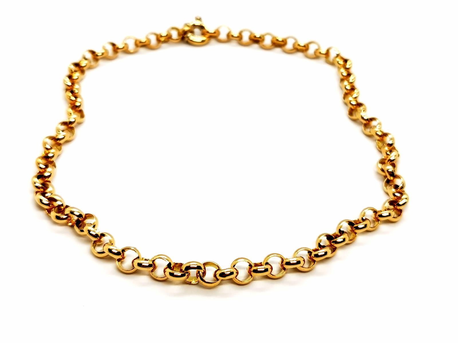 Necklace in 750 thousandths yellow gold (18 carats). jaseron link. solid. length: 44.5 cm. width of a link: 0.76 cm. thickness: 0.45 cm. fermpir buoy. total weight: 64.86 g. eagle's head hallmark. excellent condition
