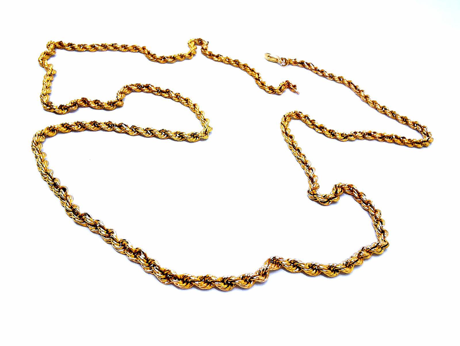Gold necklace yellow 750 mils (18 carats). jumper mesh twisted rope. length: 76 cm. width: 0.33 cm. total weight: 18.29 g. punch eagle's head. excellent condition
