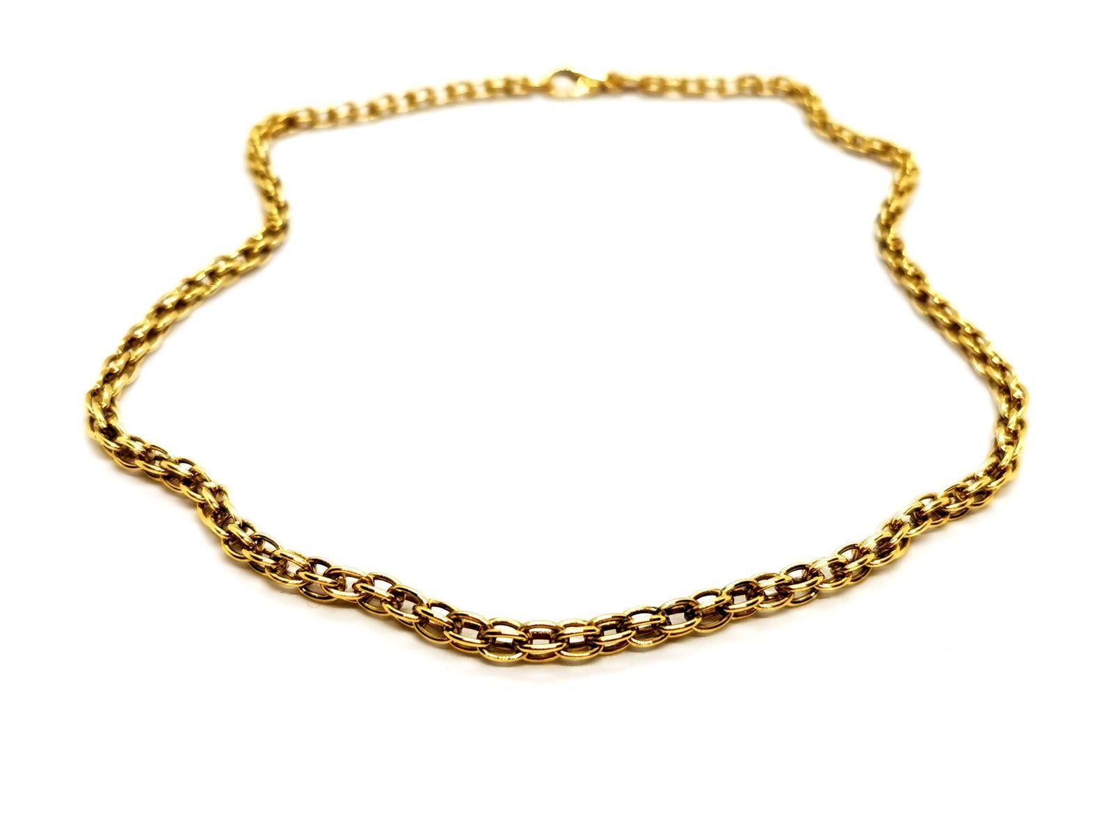 Necklace in 750 thousandths yellow gold (18 carats). quadruple oval link. length: 44 cm. width: 0.41 cm. total weight: 28.08 g. Owl hallmark. excellent condition.
