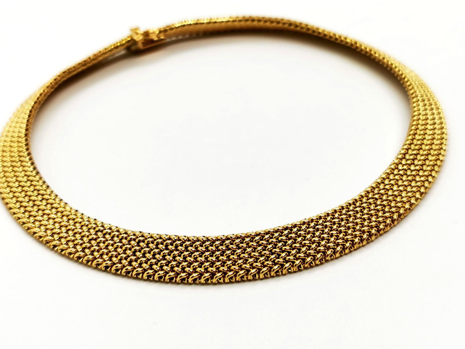 Necklace in yellow gold 750 thousandths (18 carats). Polish mesh. length: 36 cm. width: 1.14 cm. clasp tongue with two safety eights. total weight: 47.45 g. eagle head hallmark. excellent condition
