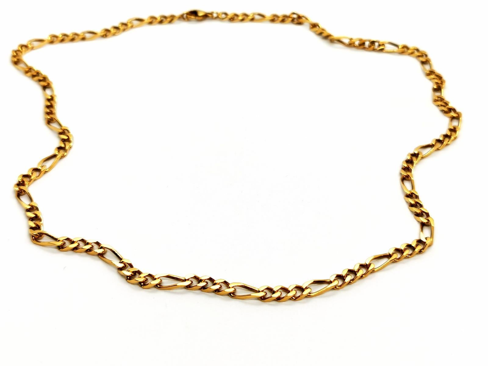 Necklace chain. in yellow gold 750 thousandths (18 carats). figaro mesh. length: 52 cm. width: 0.37 cm. total weight: 26.57g. eagle head punch. excellent condition.
