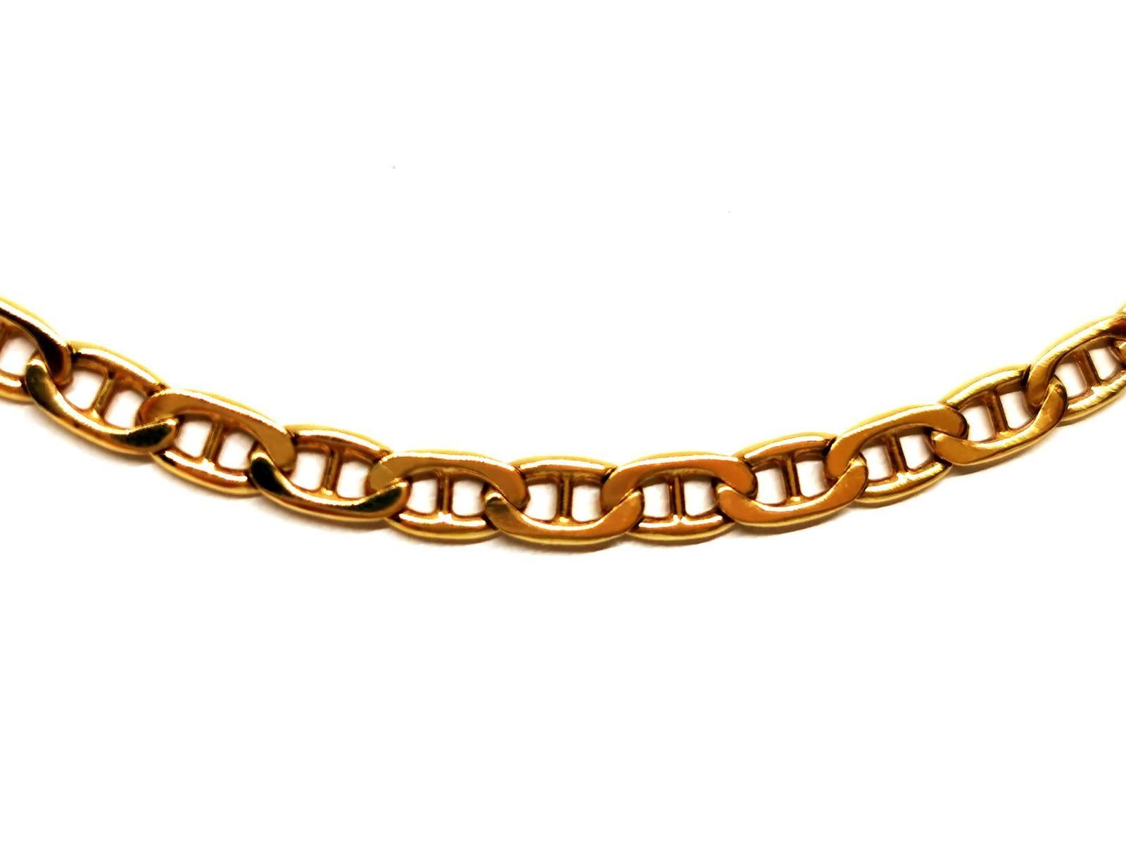 Necklace chain in yellow gold 750 thousandths (18 carats). marine mesh. length: 51.5 cm. width: 0.35 cm. carabiner clasp. total weight: 16.35g. eagle head hallmark. excellent condition.
