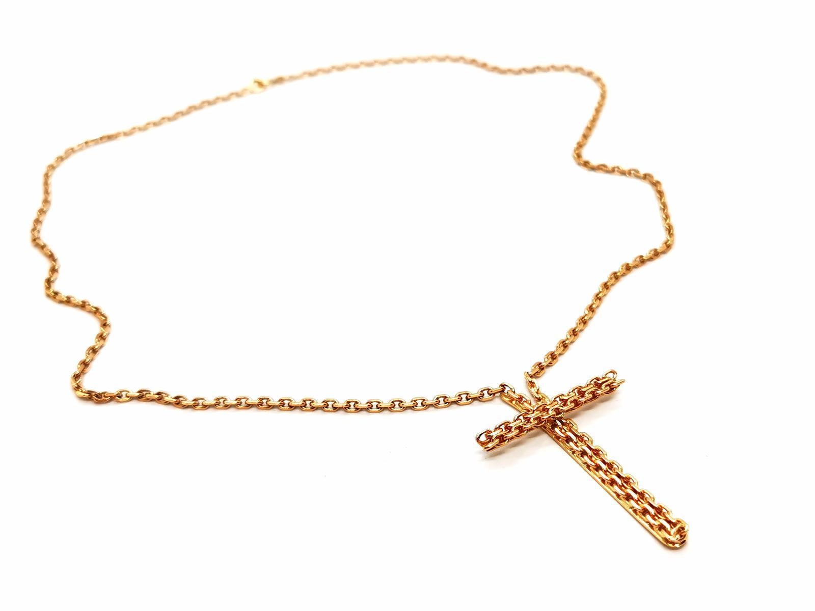 Halskette in Gelbgold 750 Tausendstel (18 Karat).gezwungen Mesh. Anhänger Kreuz . Länge: 48 cm. Breite: 0,2. Breite Anhänger: 4,5 cm X 3 cm. Gesamtgewicht: 14,83 g. Adlerkopf Punze. ausgezeichneter Zustand.

