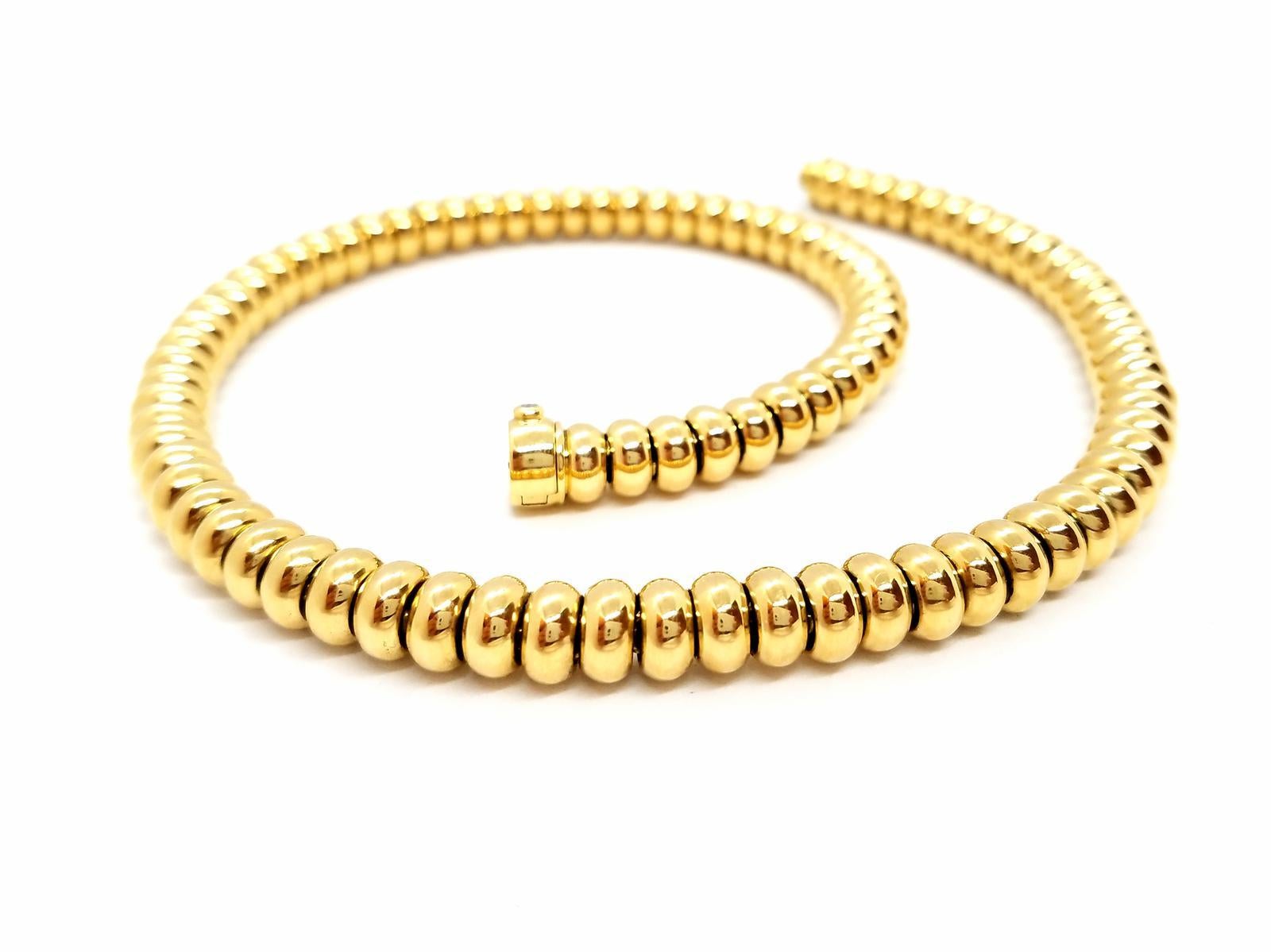 yellow gold necklace 750 mils (18 carats). crimped onto the clasp of a brilliant cut diamond of about 0.01 ct. length: 43 cm. width: 0.82 cm. total weight: 118.43 g. punched . excellent condition
