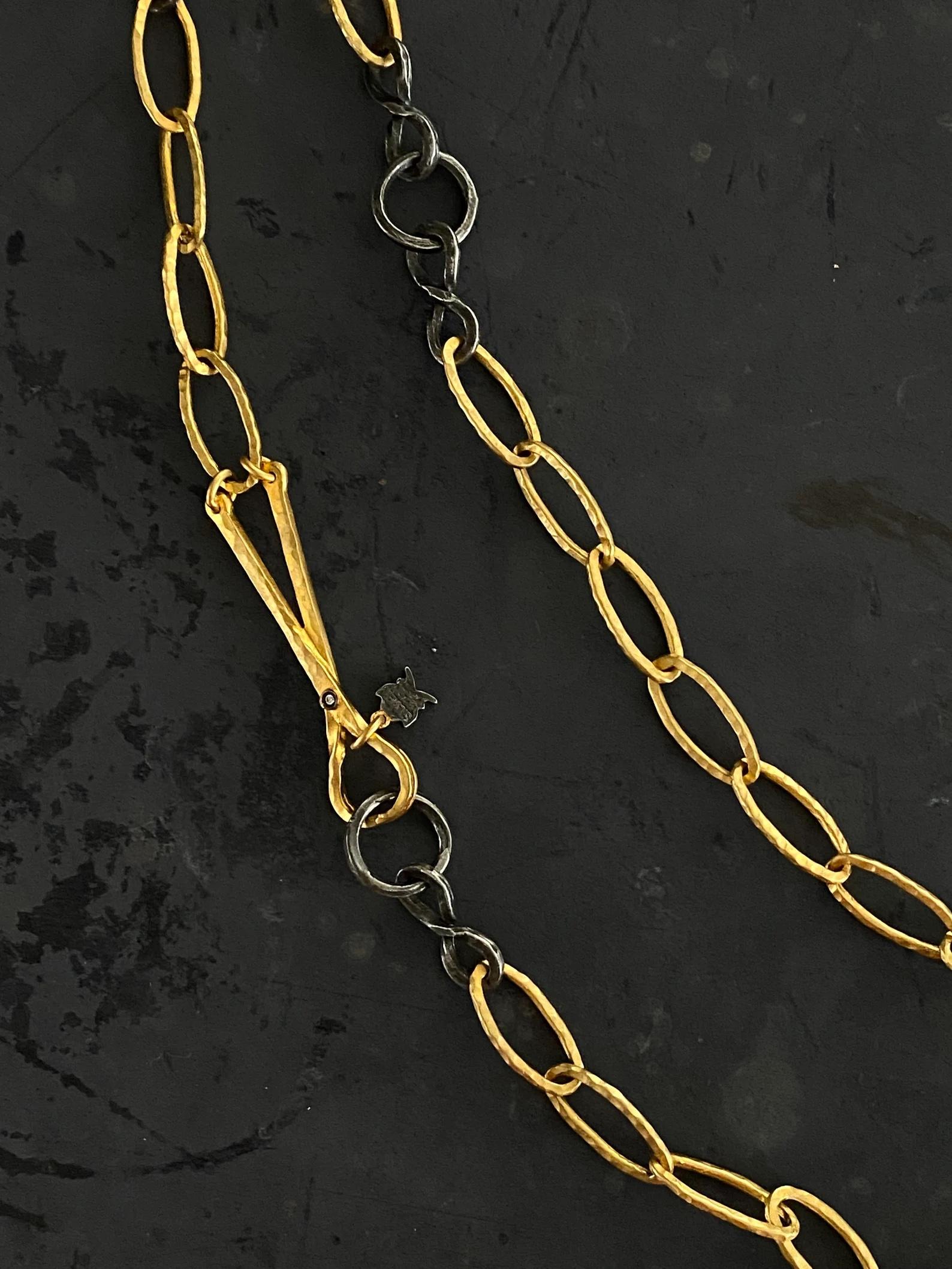 The Chain of Goldenhorn, 24K Yellow Gold and Silver with Diamonds, by Kurtulan Jewellry of Istanbul, Turkey.  This necklace is made to order by Kurtulan in Istanbul, Turkey.  Delivery takes approximately 4-6 weeks.

Chain length: 38”
Sterling - 925