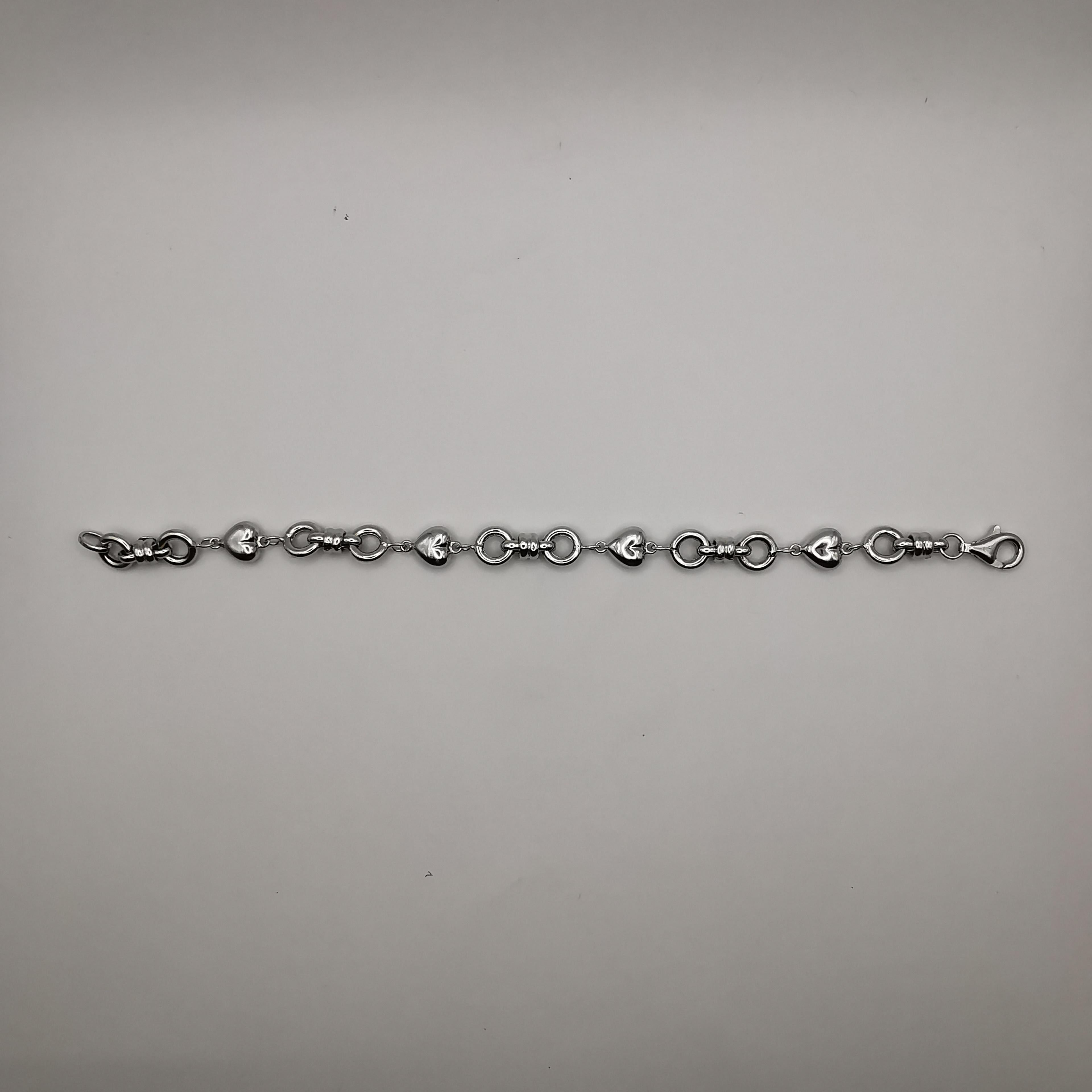 Contemporary Chain of Hearts Bracelet in 18K White Gold For Sale