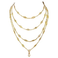 Chaine collier sautoir en or 18 Carats à mailles filigranes vers, 1930