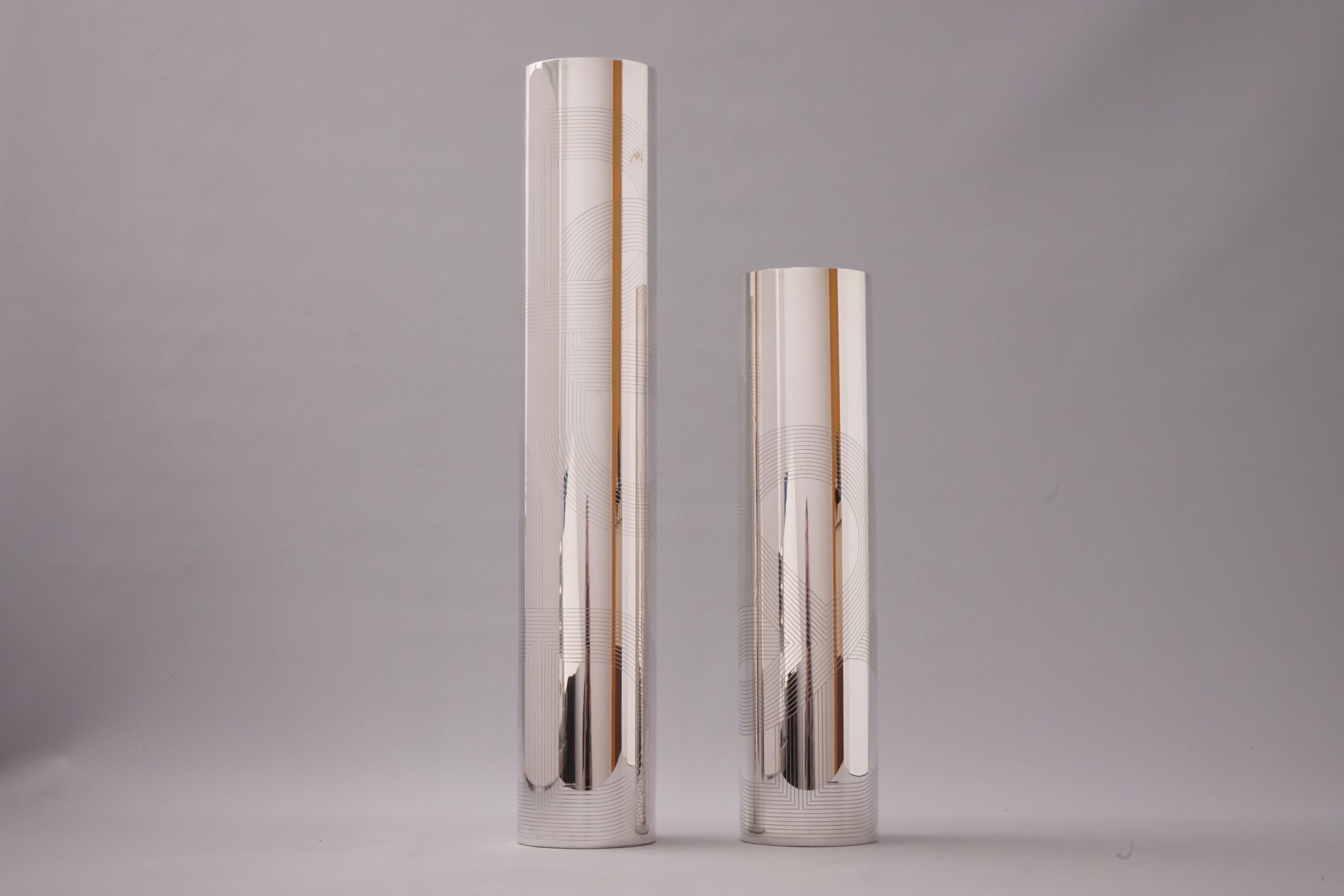 Chaîne d'Ancre Vase by Hermès Paris, set of 2. 

Pair of imposing silver-plated vases from the Mainson of Hermès Paris, decorated with the classic decor 