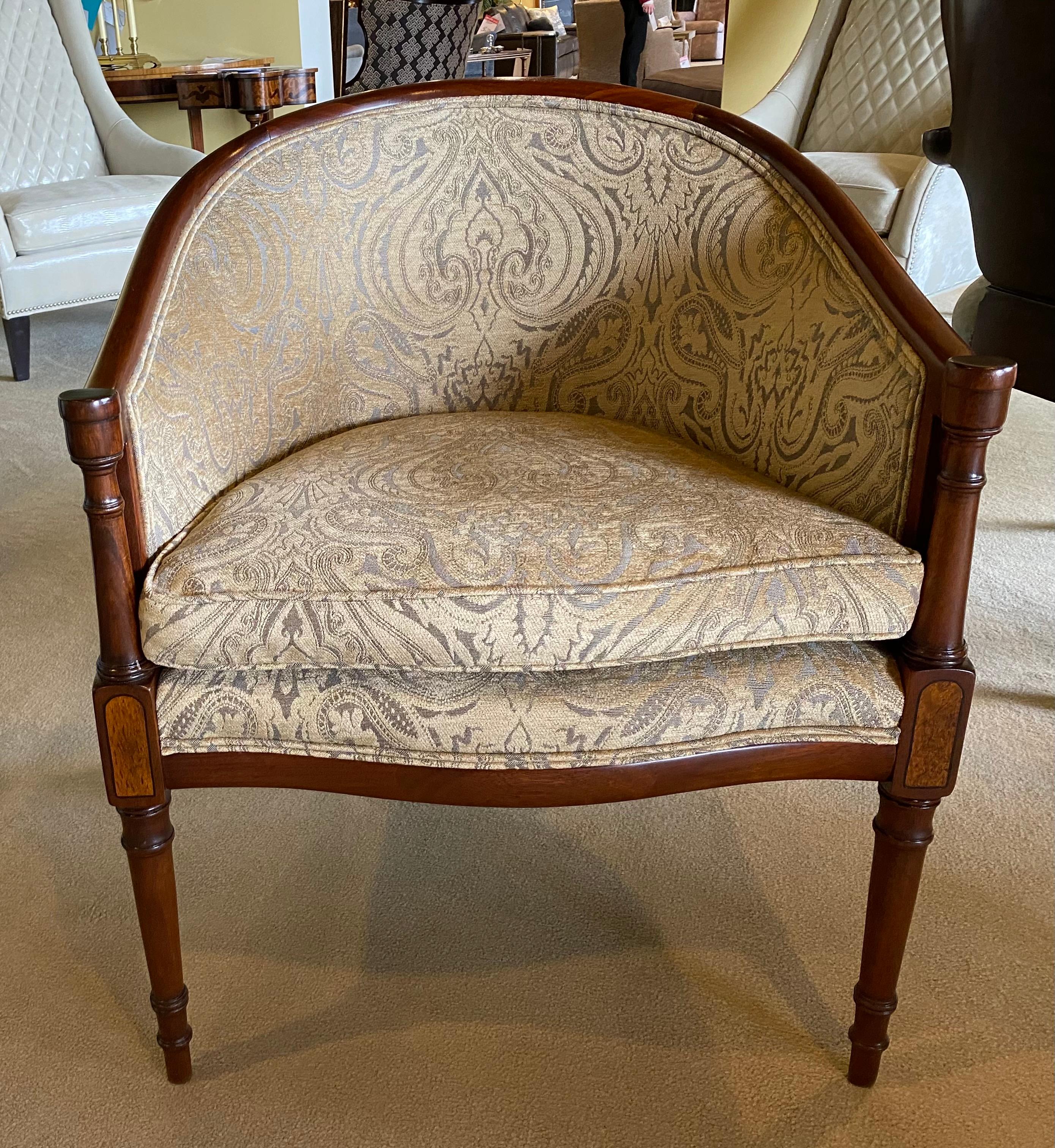 This is a beautifully restored 18th Century style chair with a refinished mahogany frame and new upholstery
originally crafted by Hickory White this frame has the subtle inlay paneling the Hepplewhite style on three sides of the mahogany frame. The