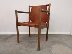 Poltrona vintage di metà secolo con seduta in pelle, anni '60