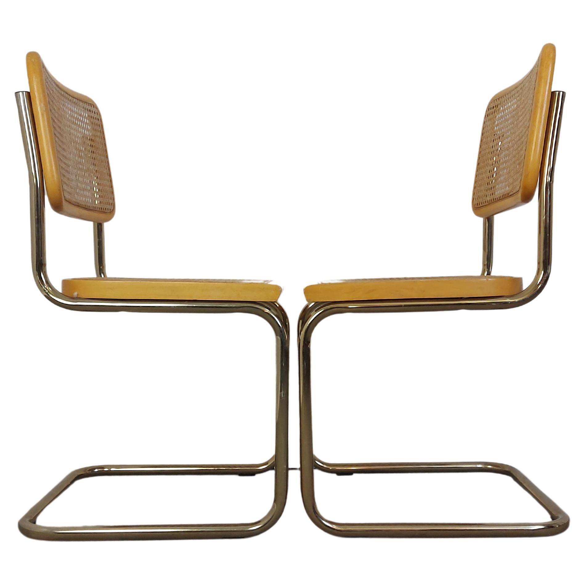 Chair Pair beautiful design Classic
Period: 1980s
Style: Mid-Century Modern, Classic
Materials: wood, cane webbing, chromed metal frame
Colours: Clear wood, Chromed metal frame with gold plating
Condition: Wood, cane, chrome beautiful vintage