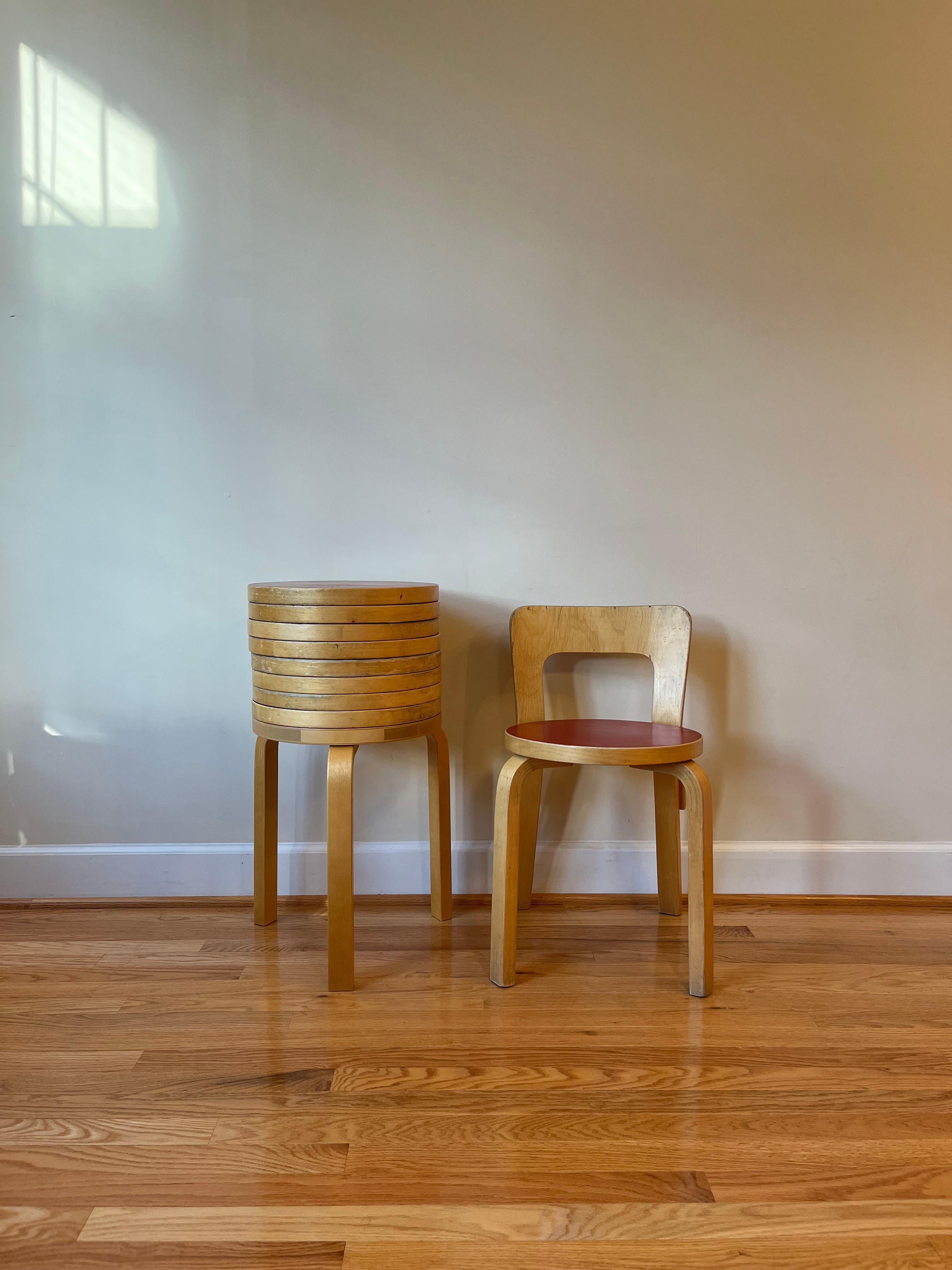 Clean lines and a simple structure define the design of Chair 65. 

A low, rectangular backrest is formed from a single piece of birch plywood and has a slight curve that forms naturally to the back, offering comfort and support. 

The height of the