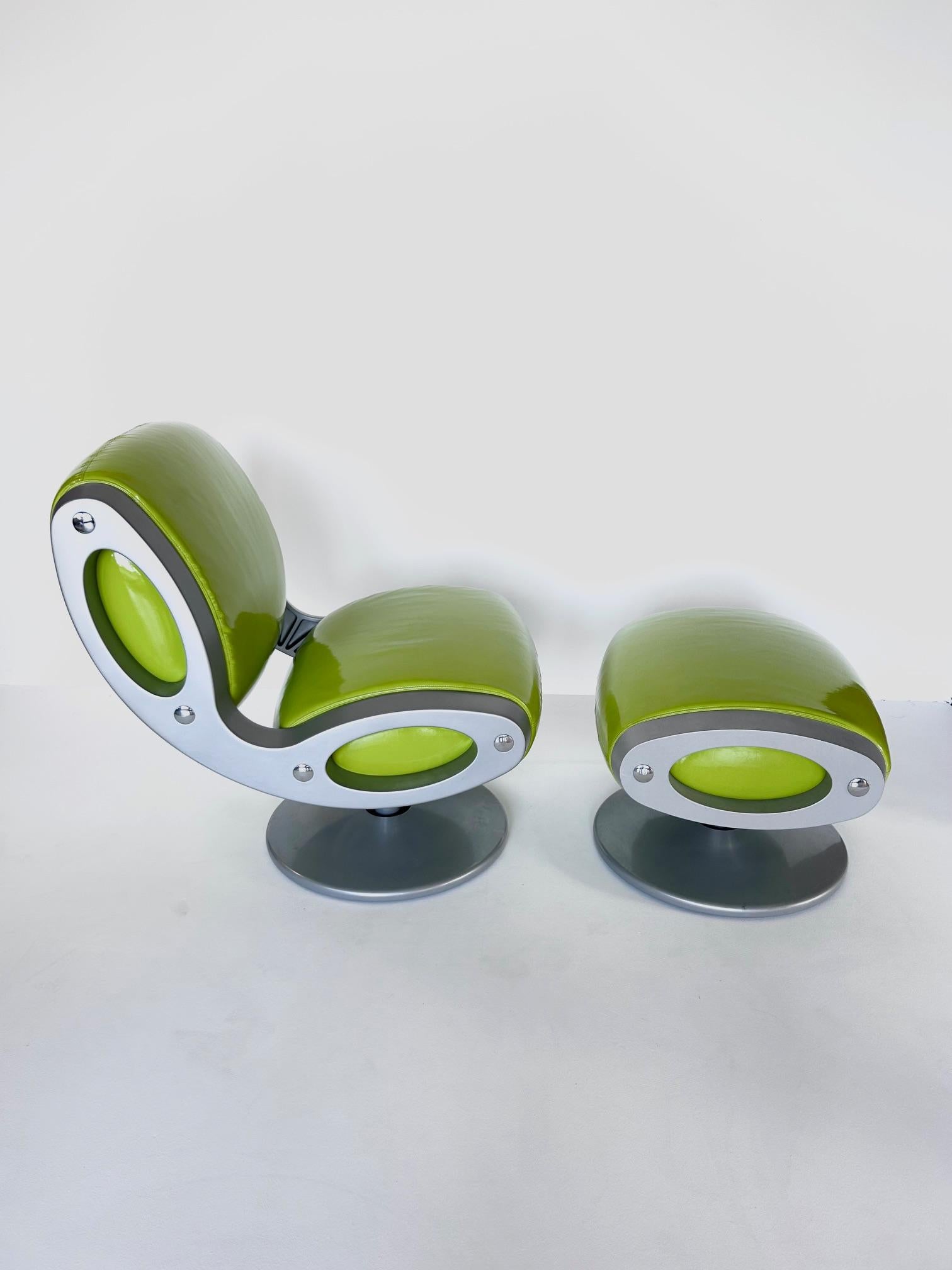 “Gluon” chair and pouf by Marc Newson, Moroso, 1993  

A revolutionary swivel chair and ottoman designed by Marc Newson in 1993. Original fabrics and Moros labels present.  
This armchair is in perfect condition, this model is no longer in
