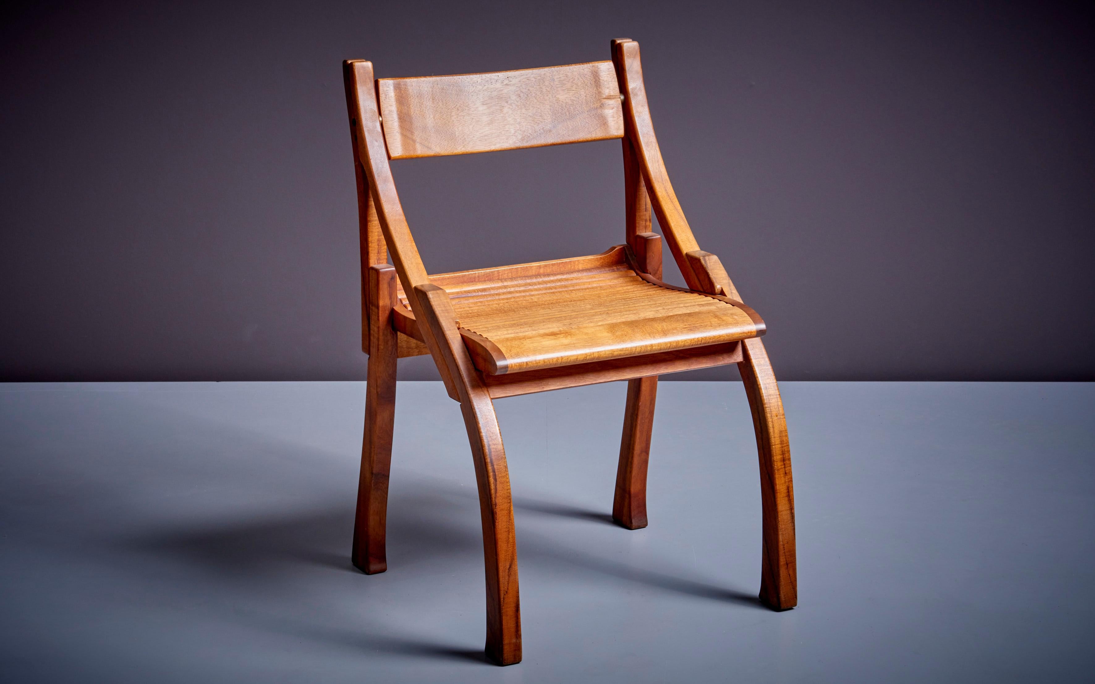 Chair with flexible backrest by Bruce Erdman in Koa Wood.