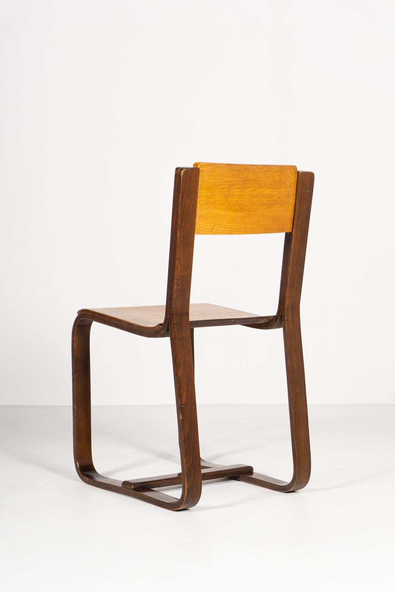 Chair, plywood construction, dark stained, ash veneer
Design / Giuseppe Pagano Pogatschnig 1938
Dimensions / H.84cm W.40cm D.50cm
Manufacturer / Maggioni Italy
Designed for the Bocconi University in Milan, no serial production

TWO CHAIRS AVAILABLE.
