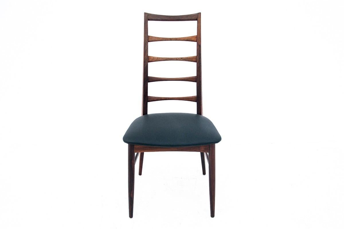 Danish chair from the 1960s. Furniture in very good condition, after professional renovation, seat upholstered with new black natural leather.

Dimensions: height 96 cm / height of the seat. 42 cm / width 47 cm / dep. 54 cm.