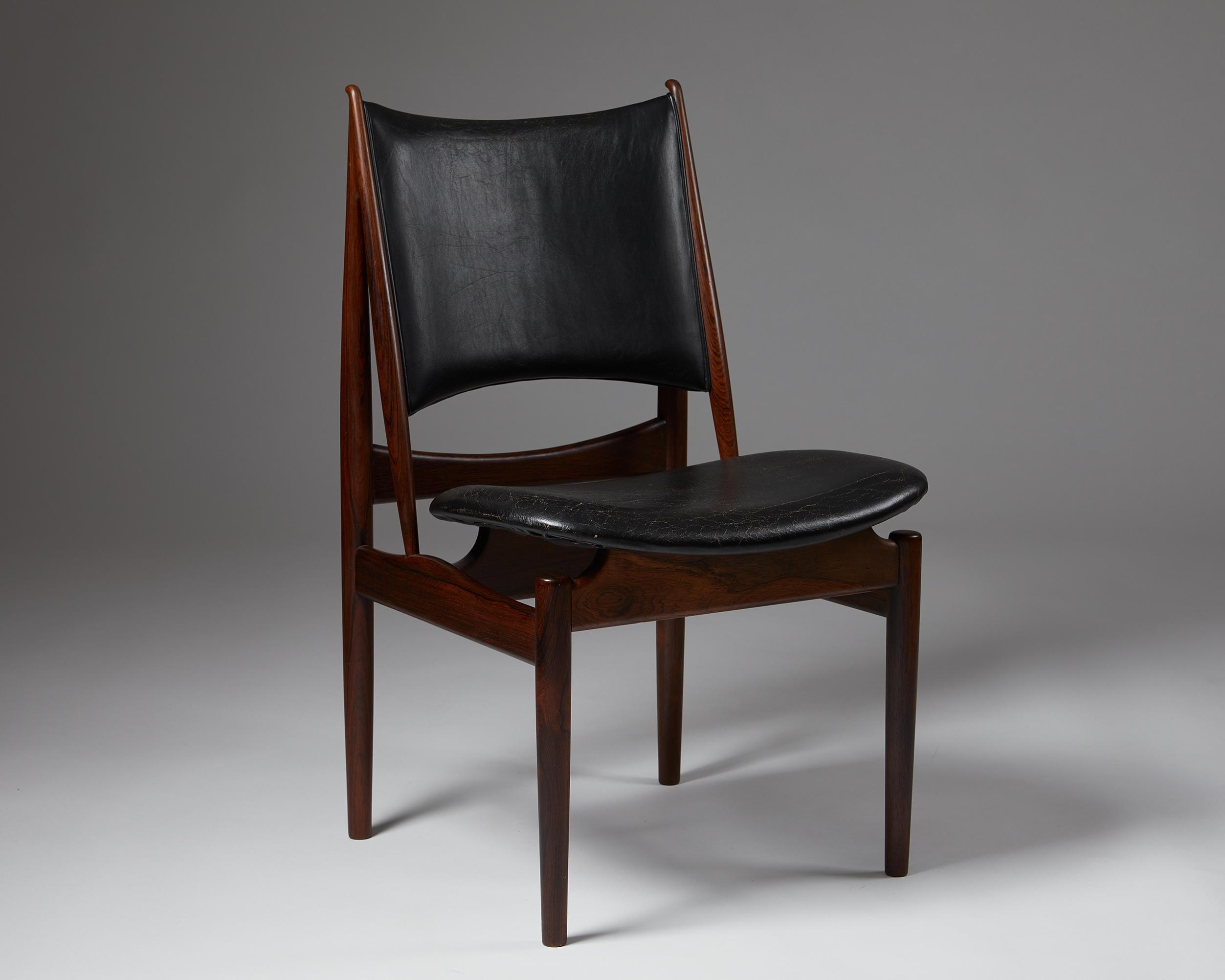 Chair “Egyptian” designed by Finn Juhl for Niels Vodder,
Denmark, 1949.
Made and stamped by the maker.

Brazilian rosewood and leather.

Measurements: 
H: 89.2 cm / 2' 11 1/4’’
SH: 47.5 cm / 1' 6 1/2’’
W: 54 cm / 1' 9 1/2’’
D: 54.2 cm / 1' 9