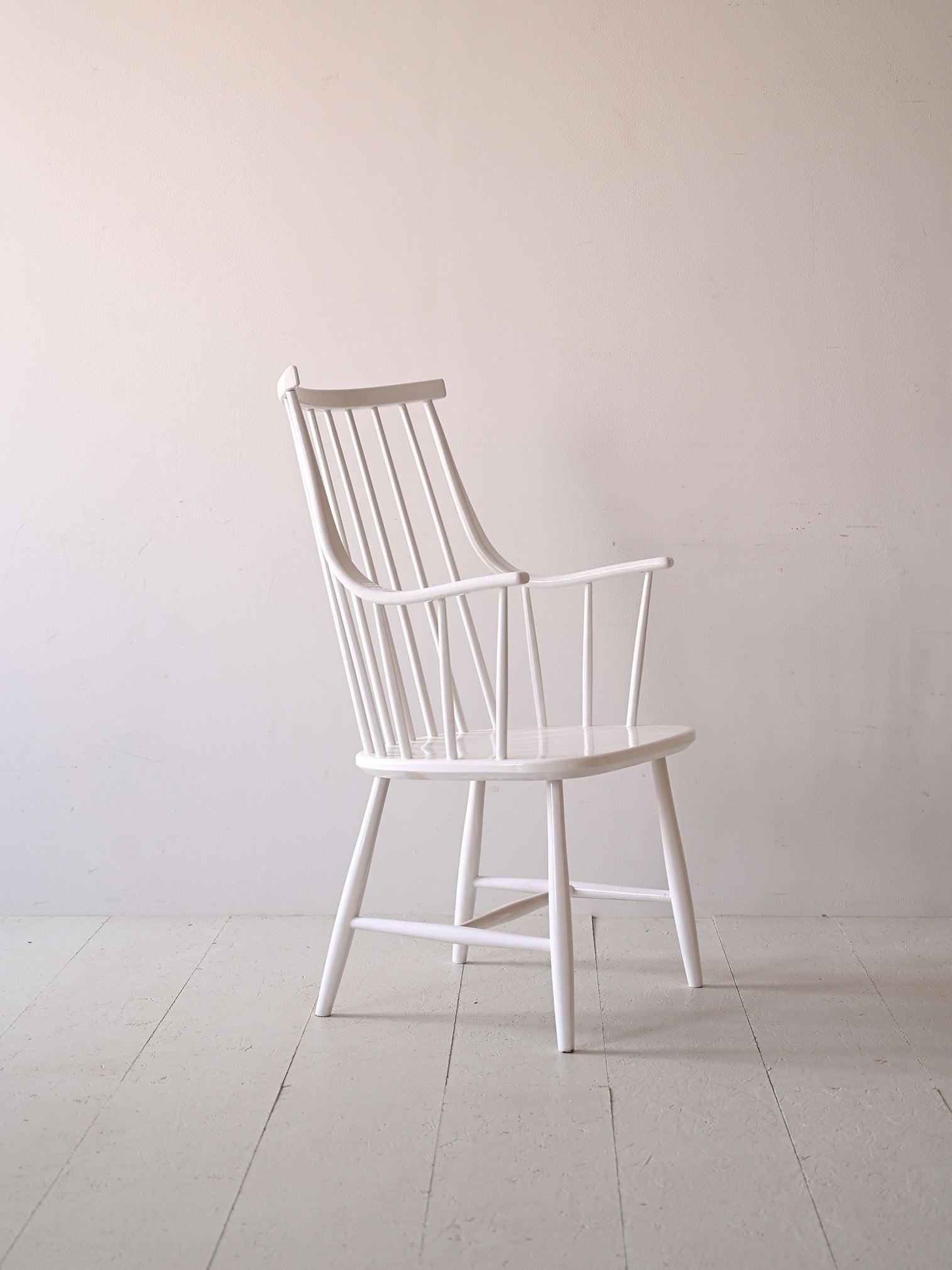 Wooden chair with original vintage arms model 'Grandessa' designed by designer Lena Larsson in the 1950s.
The frame is painted white and has the original stamp.

Good condition. A conservative restoration has been done. It may show some signs of