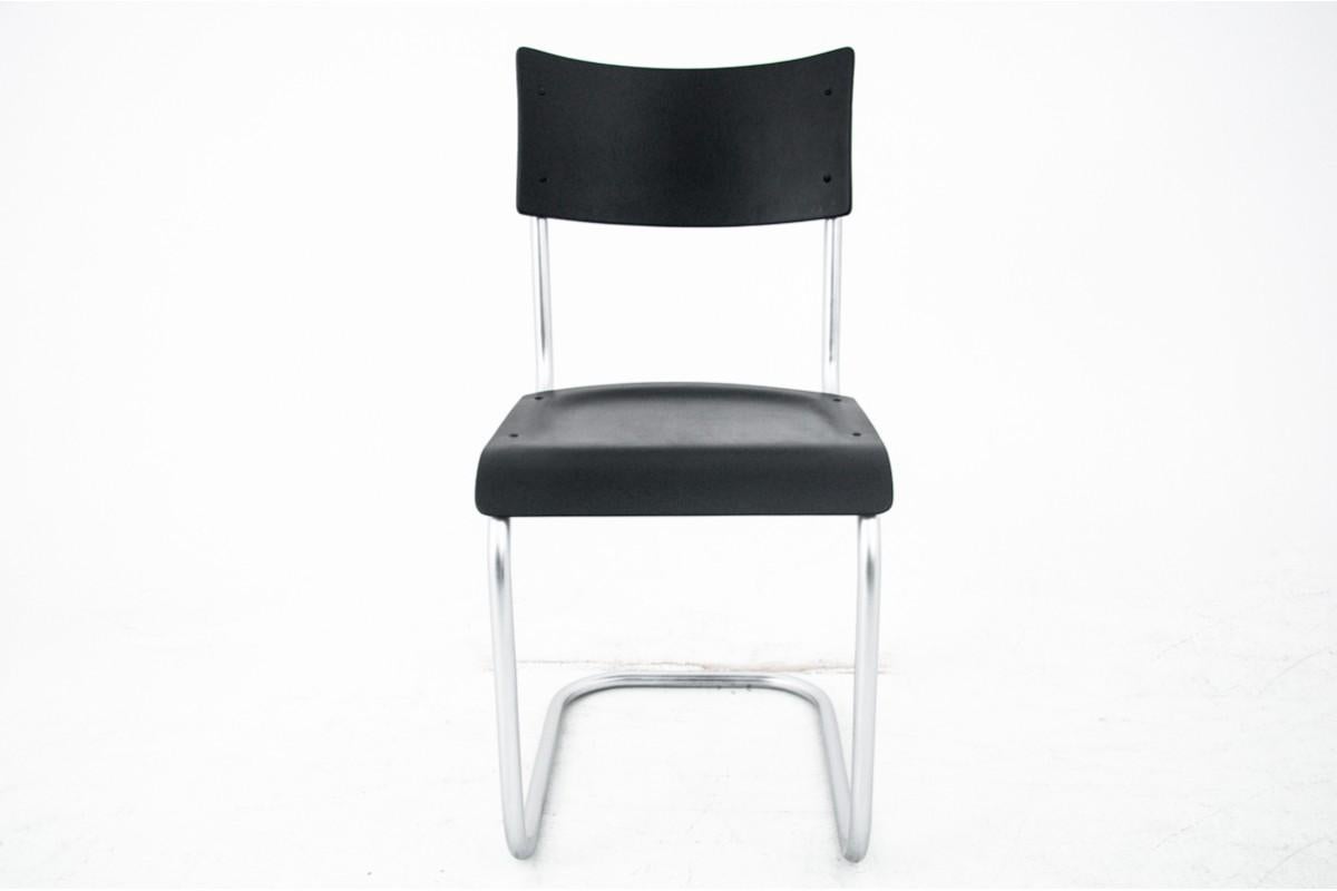 Chair designed by Marta Stama, Poland, 1930s

The chair was designed by Marta Stam, a Dutch architect and Bauhaus lecturer, and was made at the East Steel Furniture Factory in Zajiel near Żywiec. It is a type of 