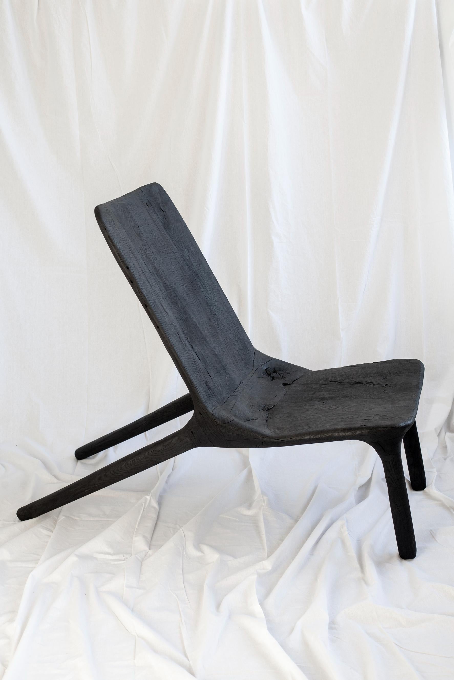 Chair Eclipse by Antoine Maurice
Dimensions: W 120 x D 85 x H 55 cm
Materials: Solid oak beams, assembled, carved and burned


Ethnic-inspired, the Eclipse range of furniture gives pride of place to primitive lines… as well as recycled