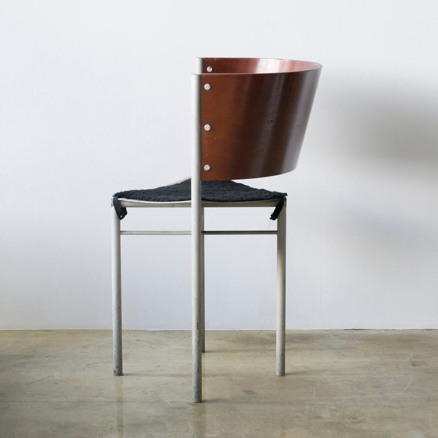 Chair designed especially for Cafe Mystique. Cafe Mystique was situated in Tokyo, and a restaurant where Starck designed its interior in 1988. Cafe is no longer existing.