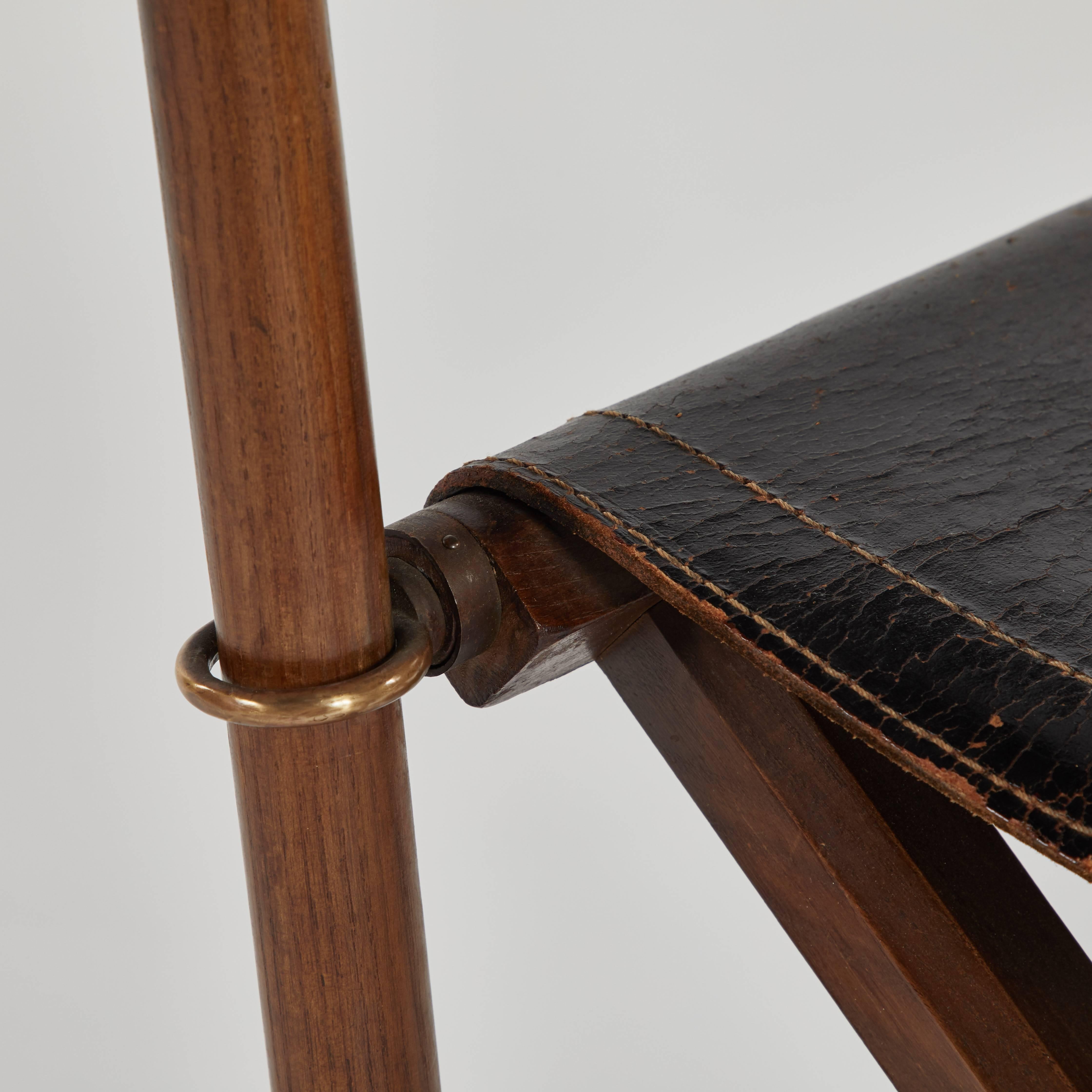 Late 19th century British campaign black leather folding chair. 