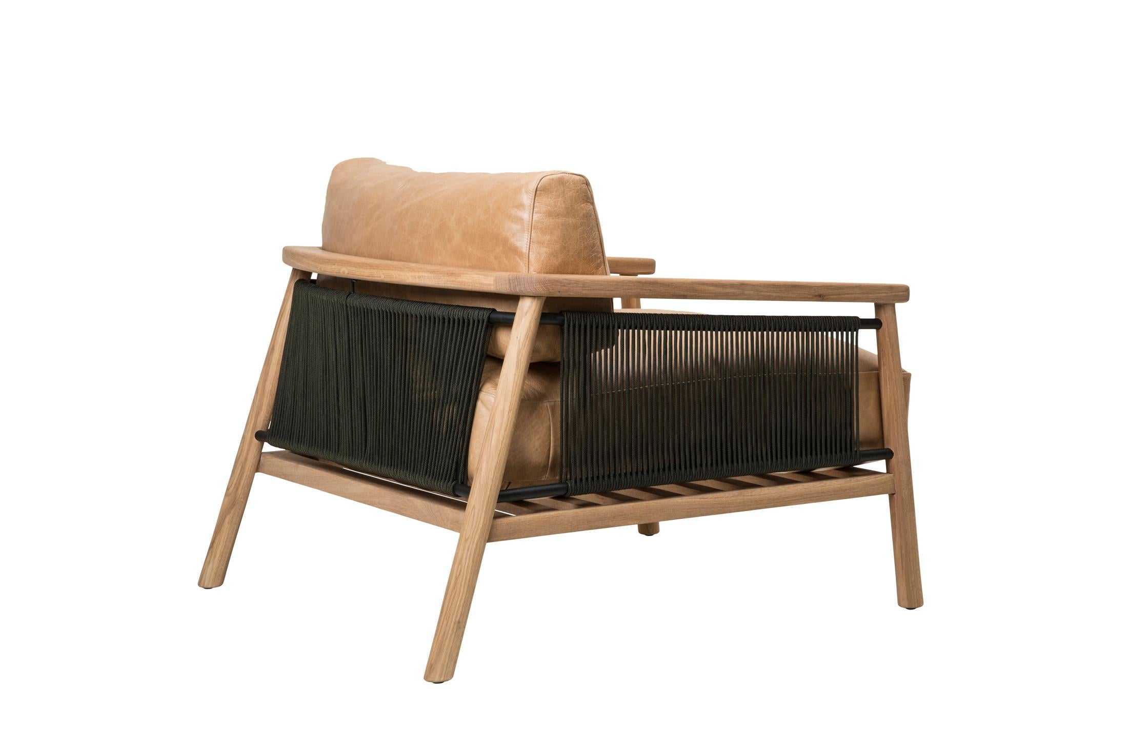 Providing a casual and modern safari aesthetic, the Imboko chair serves both style and comfort. The oversized leather cushions rest on a solid American Oak timber frame while the combination of steel and cording provide an airy accent. 
