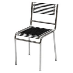 Chair in Steel and Elastic rod, René Herbst.