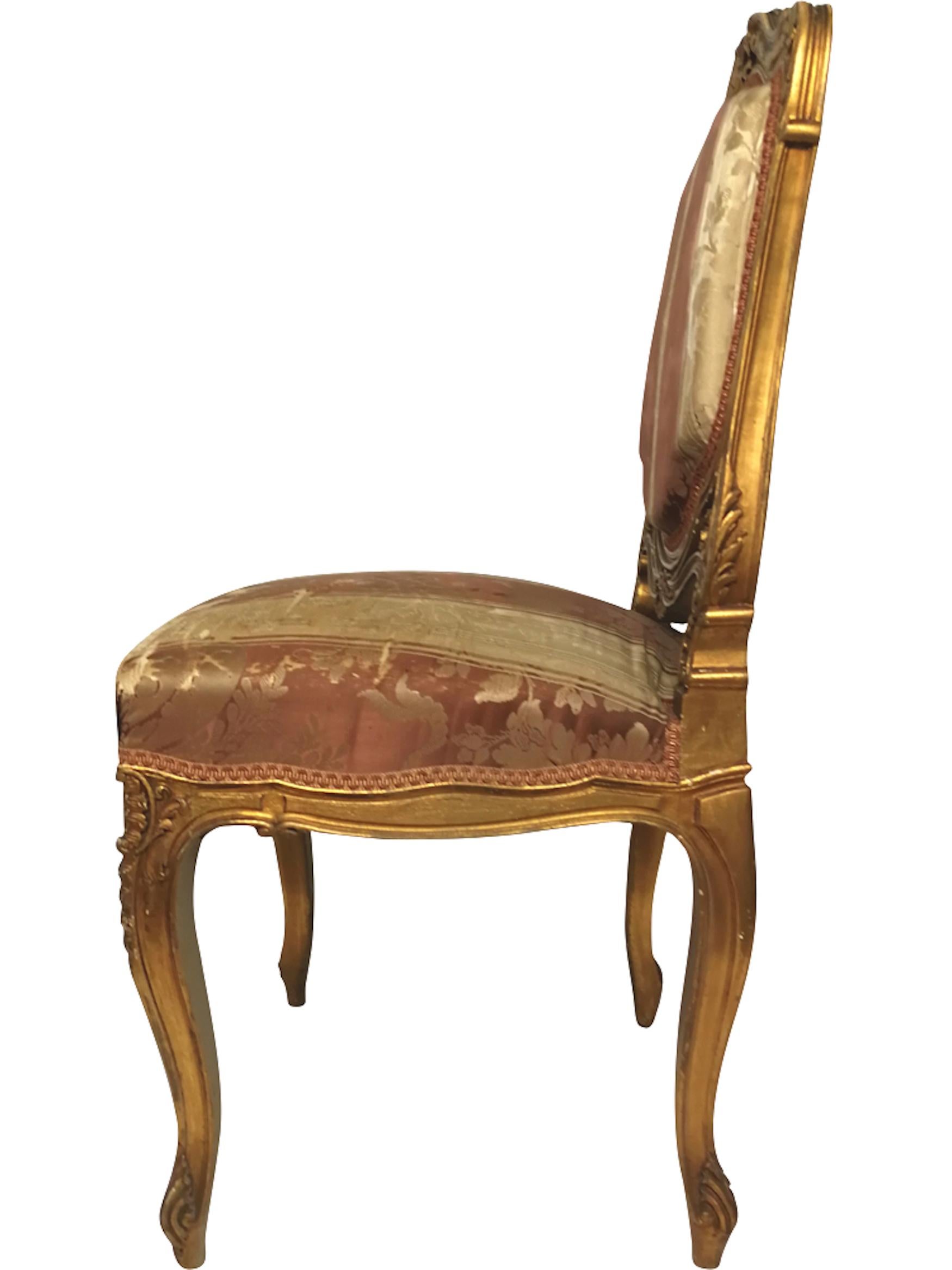 Gilt hand carved wooden chair from the 19th century in Louis XV style and with silk upholstery. The upholstery of the chair is of the period.
Origin: France.
Period: 19th century, Napoleon III period.