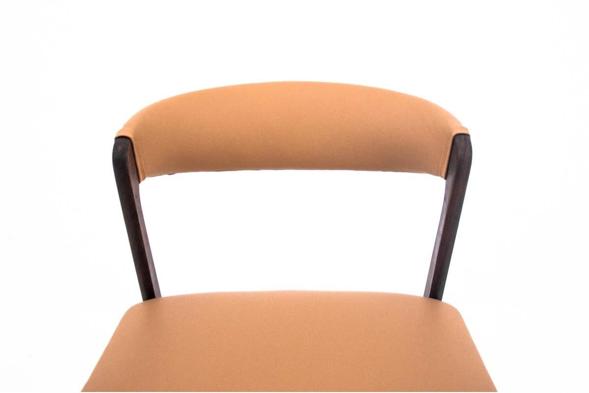A Danish chair from the 1960s. Furniture in very good condition, after professional renovation, the seat and backrest are upholstered with new natural leather.

Dimensions: Height 75 cm, height of the seat 44 cm, width 50 cm, depth 51 cm.