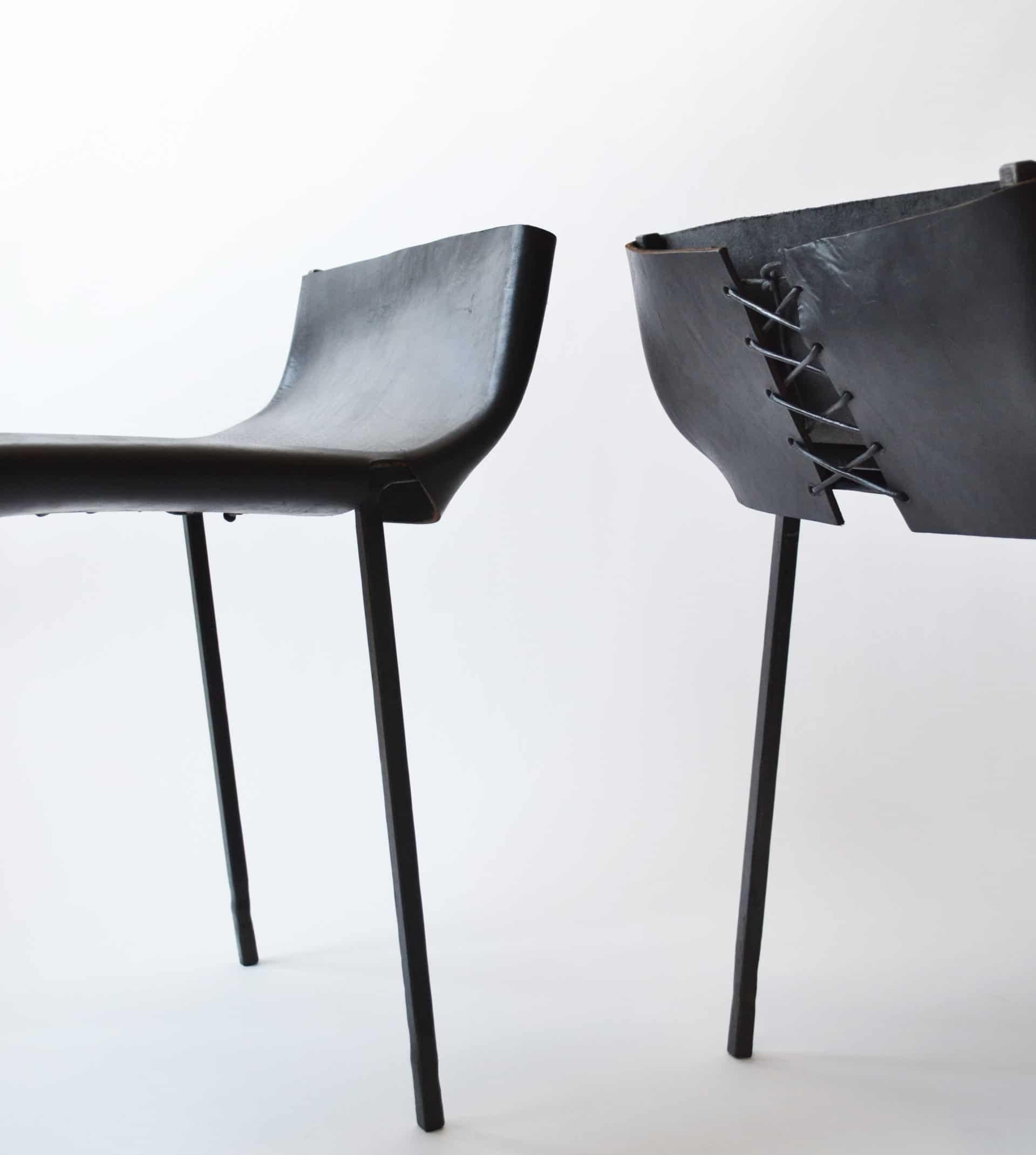 A side chair inspired by the Spanish Toreador. This special chair was designed as a functional object and a sculpture.

Blackened steel with a wax finish. Buffalo leather.

Handmade in New York.
 