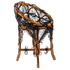 Chair of the Artist Micki Chomicki, Rattan and Synthetic Fiber