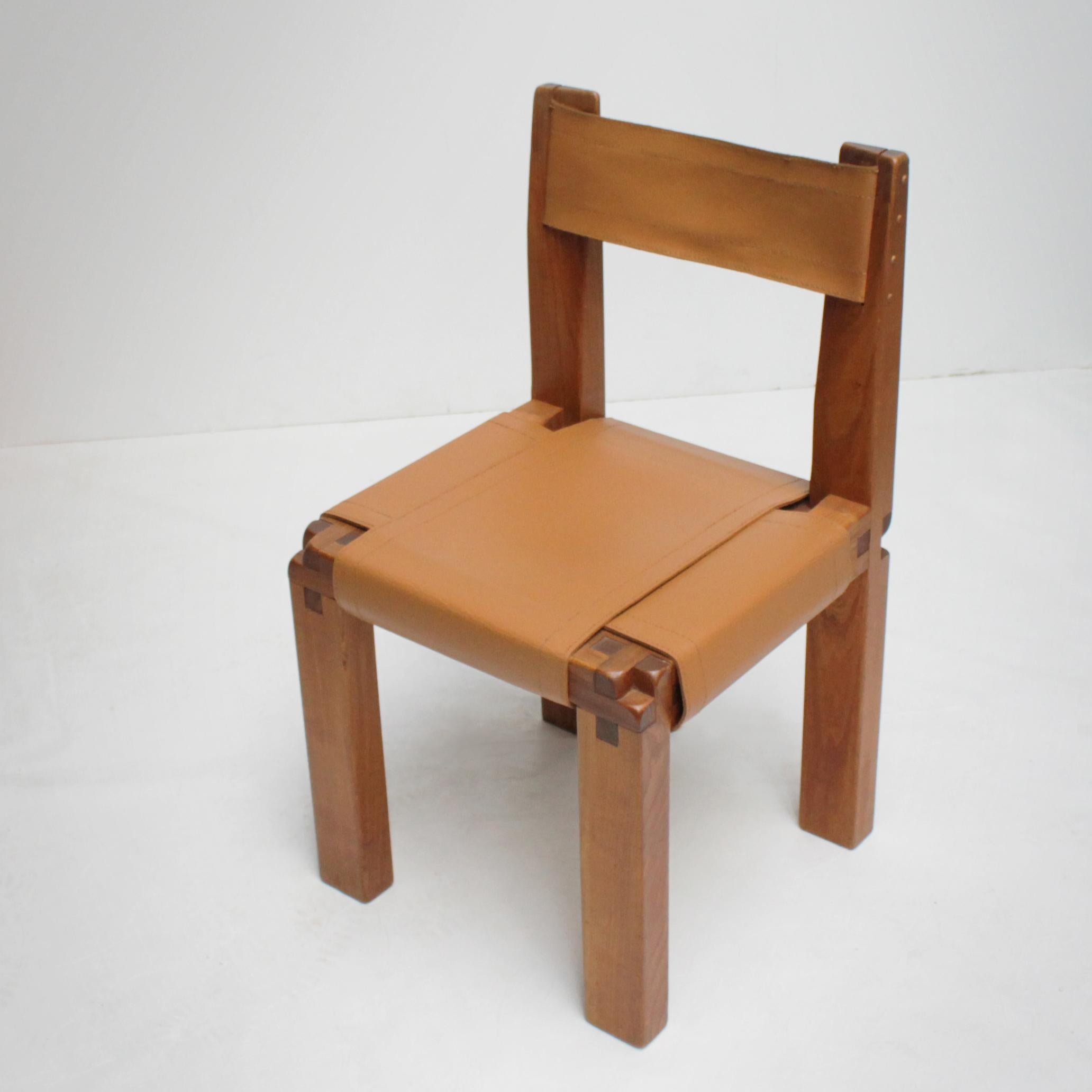 Iconic S11 chair by the French designer Pierre Chapo (1927-1987) for Atelier Chapo, Paris. Solid elm wood with beautiful wood joints. Seat and back in professionally painted saddle leather. Beautiful condition.
Dimensions: Height 30.7 in. (78 cm),