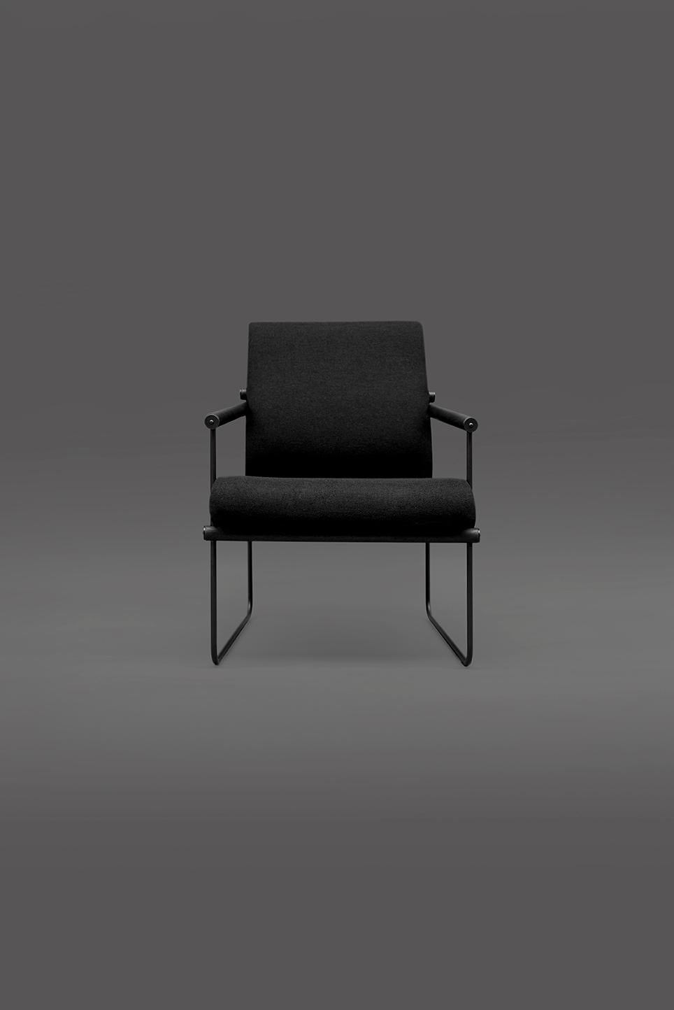 This mid-century modern 'Audrey' S12 armchair was designed by interior designer and architect Peter Ghyczy in 2017 and hand-crafted in the GHYCZY atelier. The backrest can be adjusted to the preferences of its owner. The chair’s playful construction