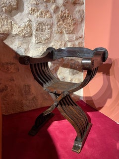 Chair with foldings slats, called "Savonarole"