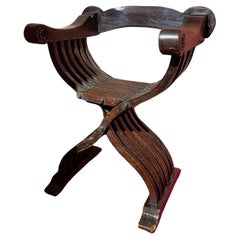 Chair with foldings slats, called "Savonarole"