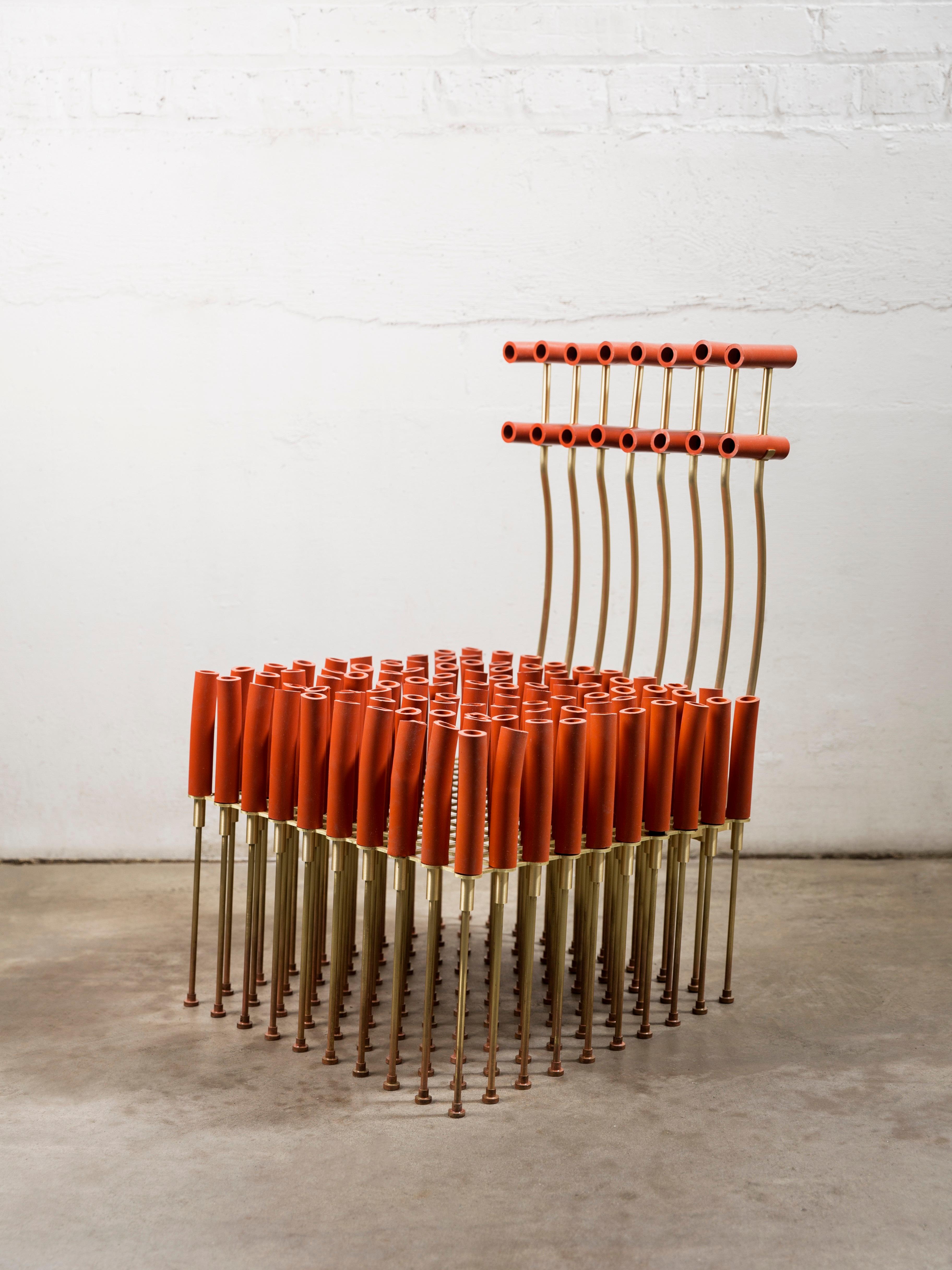 Chair with tubes and brass by Gentner Design
Dimensions: D 42.5 x W 50 x H 63.5 cm.
Materials: brass, silicone tubes

A chair? made of brass and silicone tubes.

Gentner Design
Rooted in a language of sculpture, character defining details,